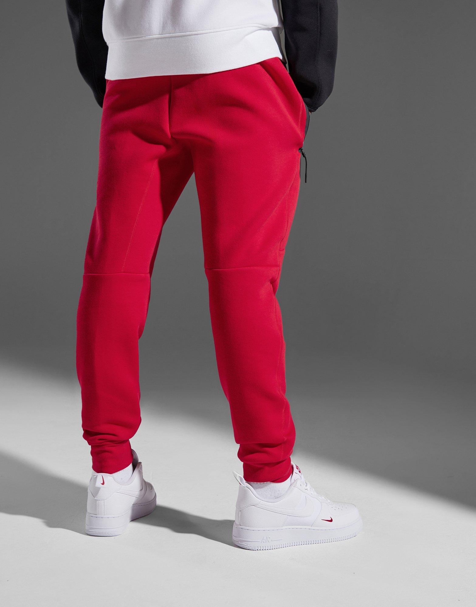 Nike store red joggers