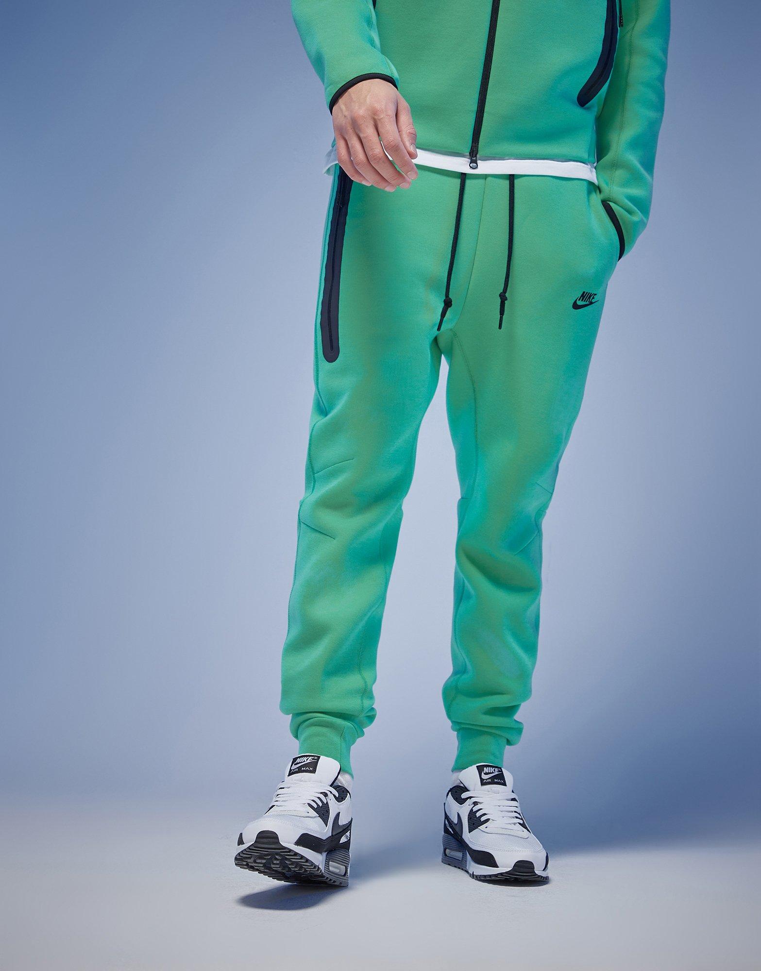 Nike fleece flare joggers and sweatshirt in Teal - Depop