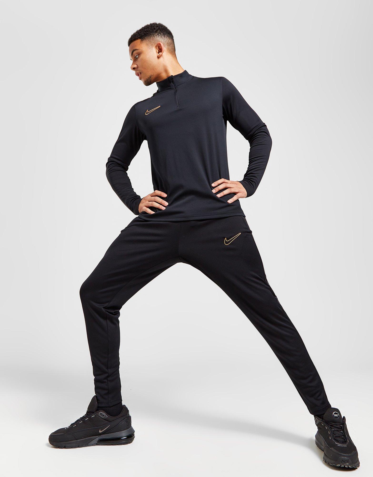 Nike Pantalon de survêtement d'entraînement pour femme Gris 1X