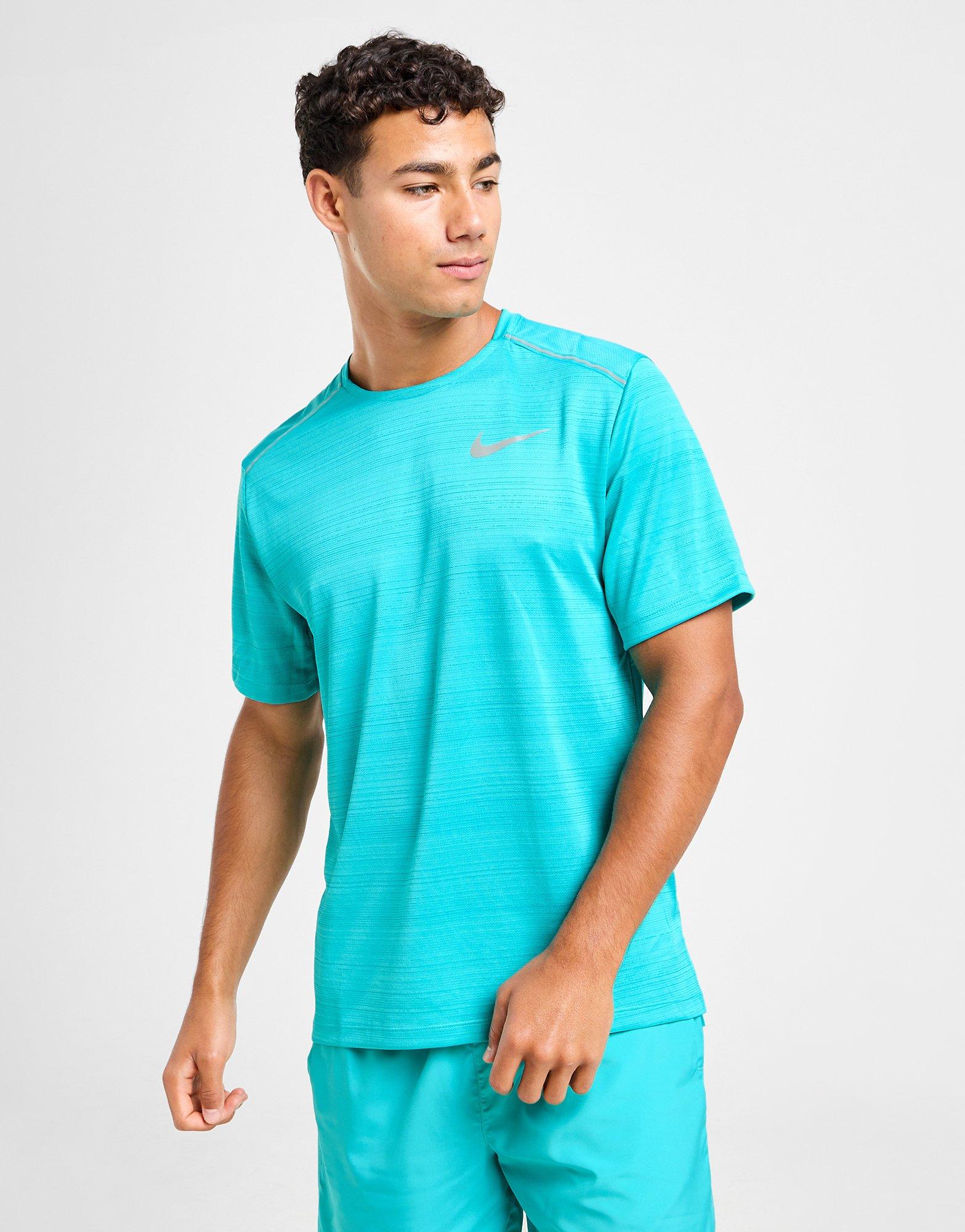 Teal nike store t shirt