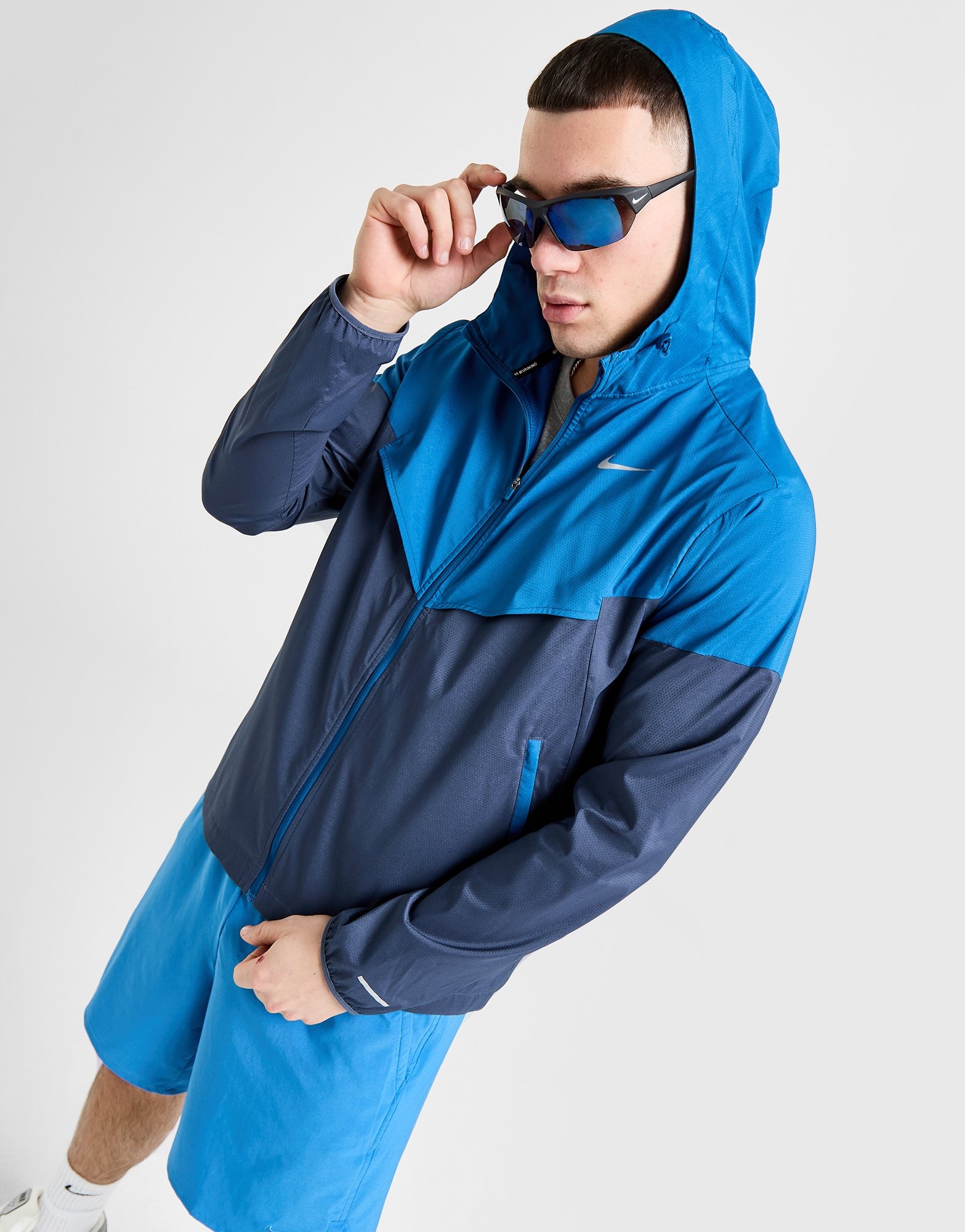 Nike windrunner red blue sale