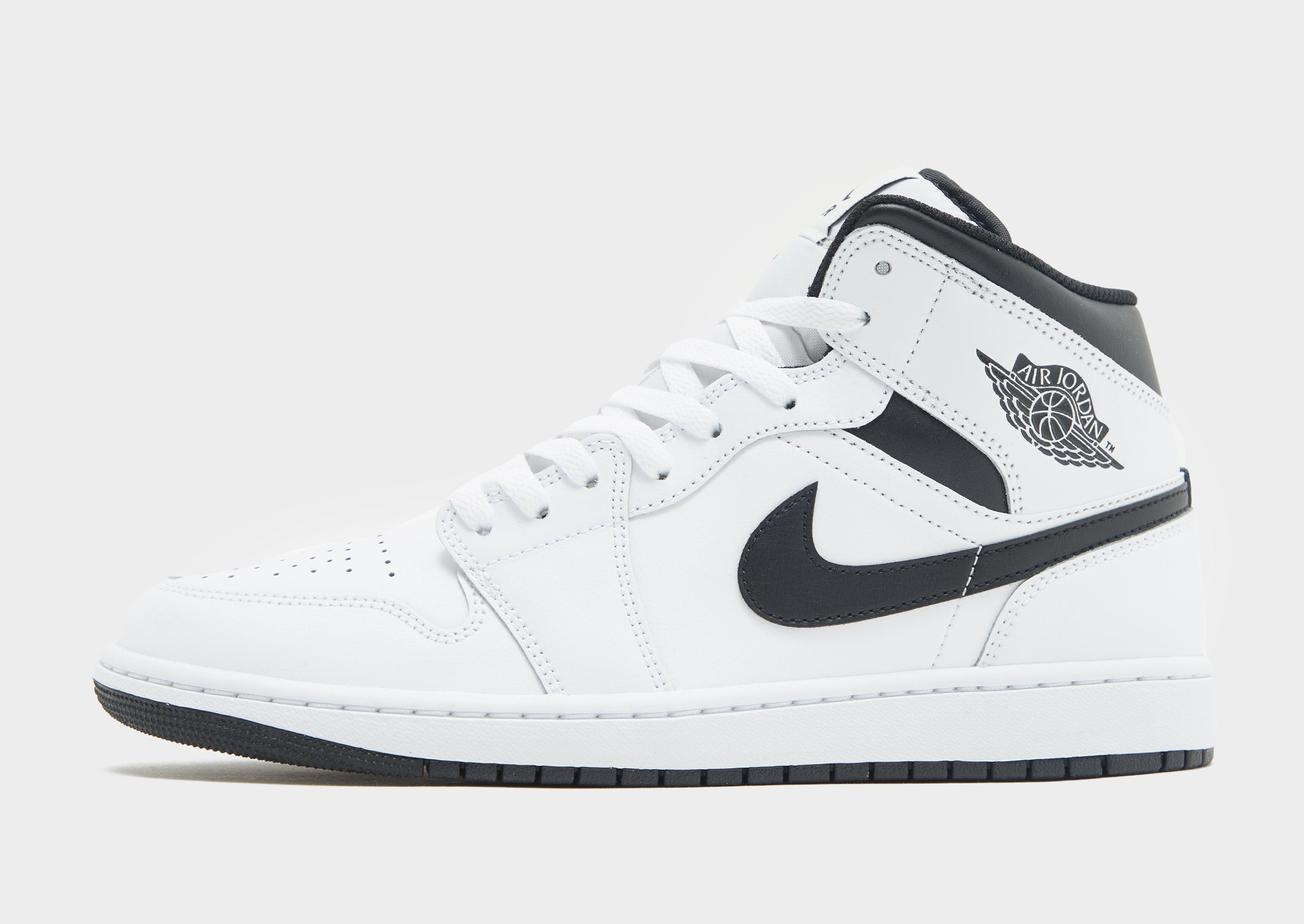 Nike air jordan 1 mid hotsell white womens world cup trainers