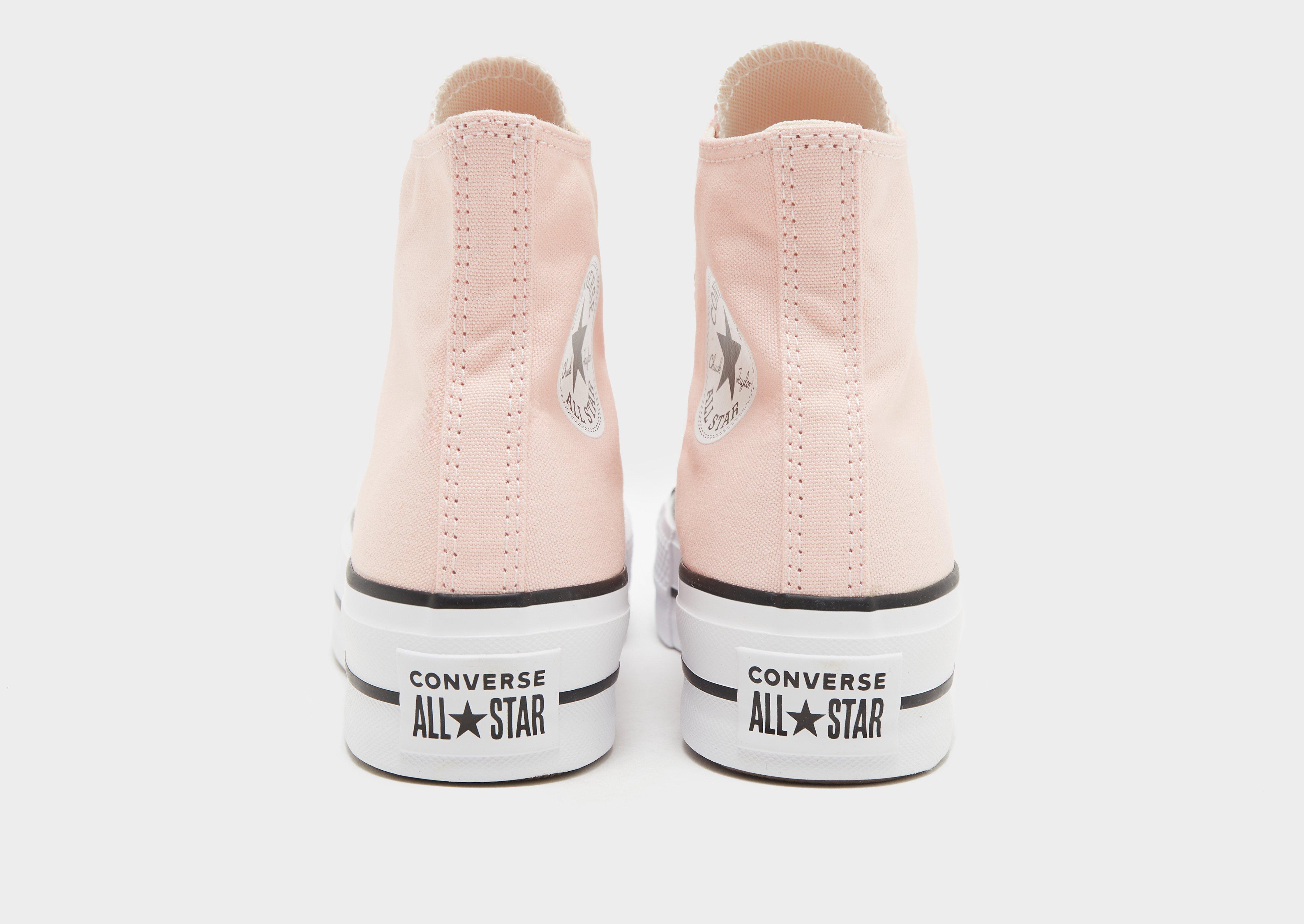 Storm pink converse deals high tops