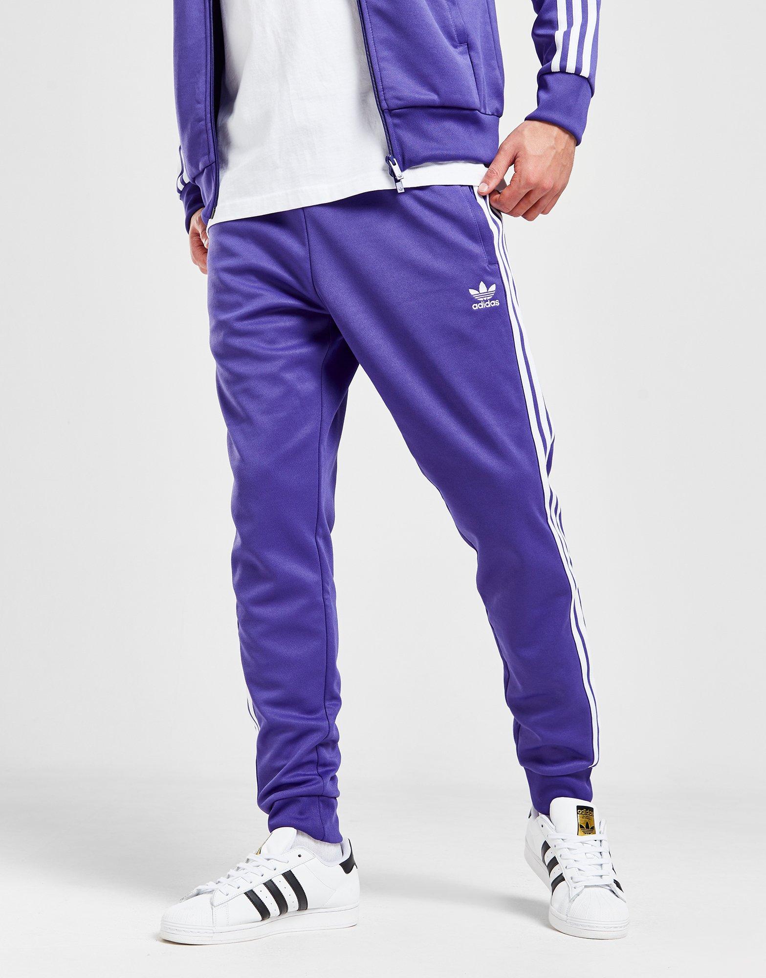 Adidas sst track pants 2024 purple