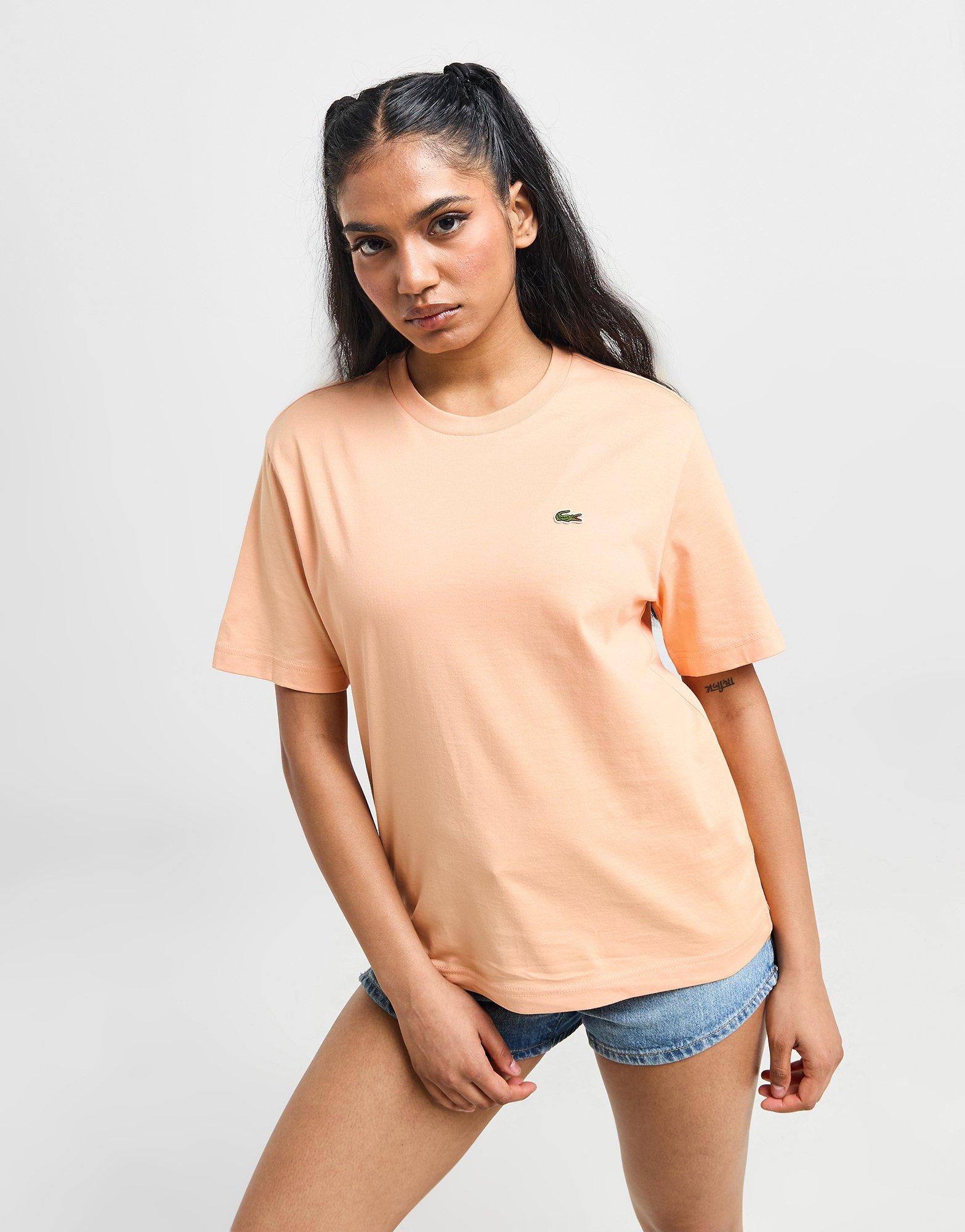 Peach lacoste shirt hotsell