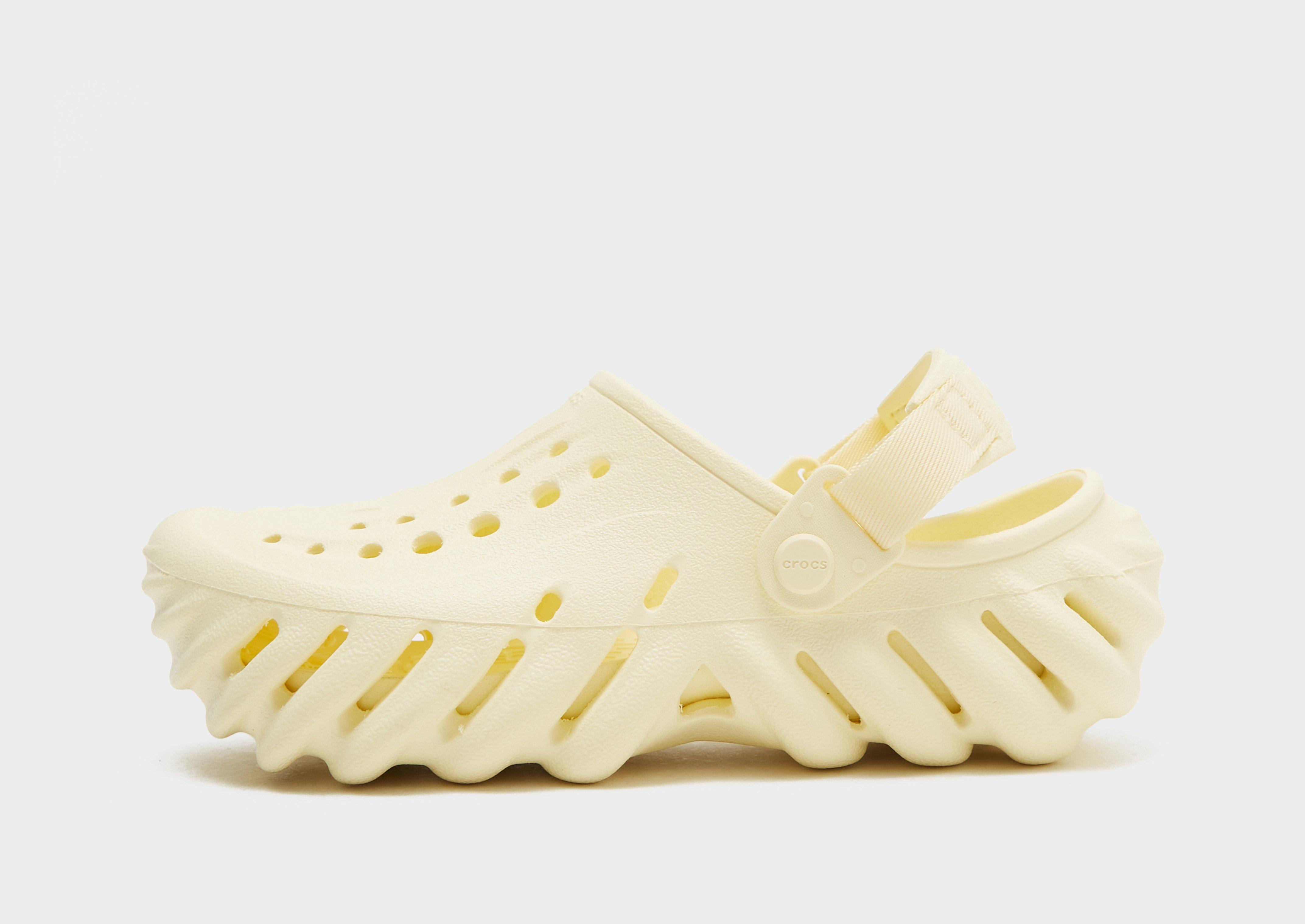 White and on sale yellow crocs