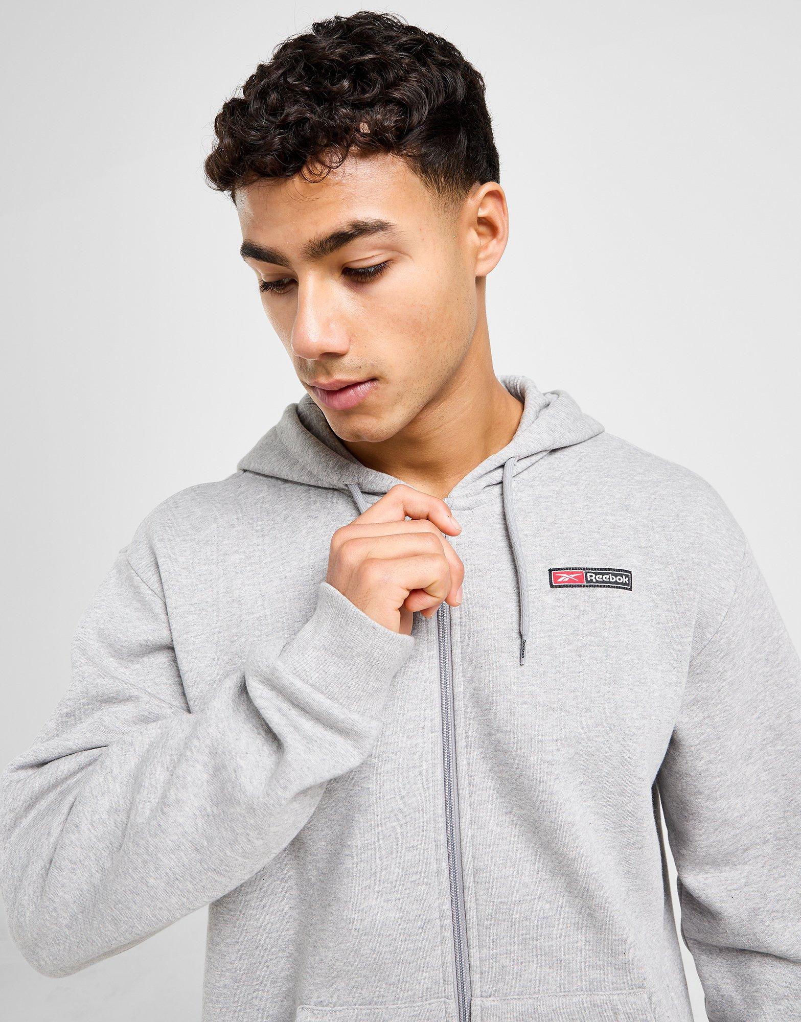 Reebok Sweat à Capuche Zippé Woven Homme