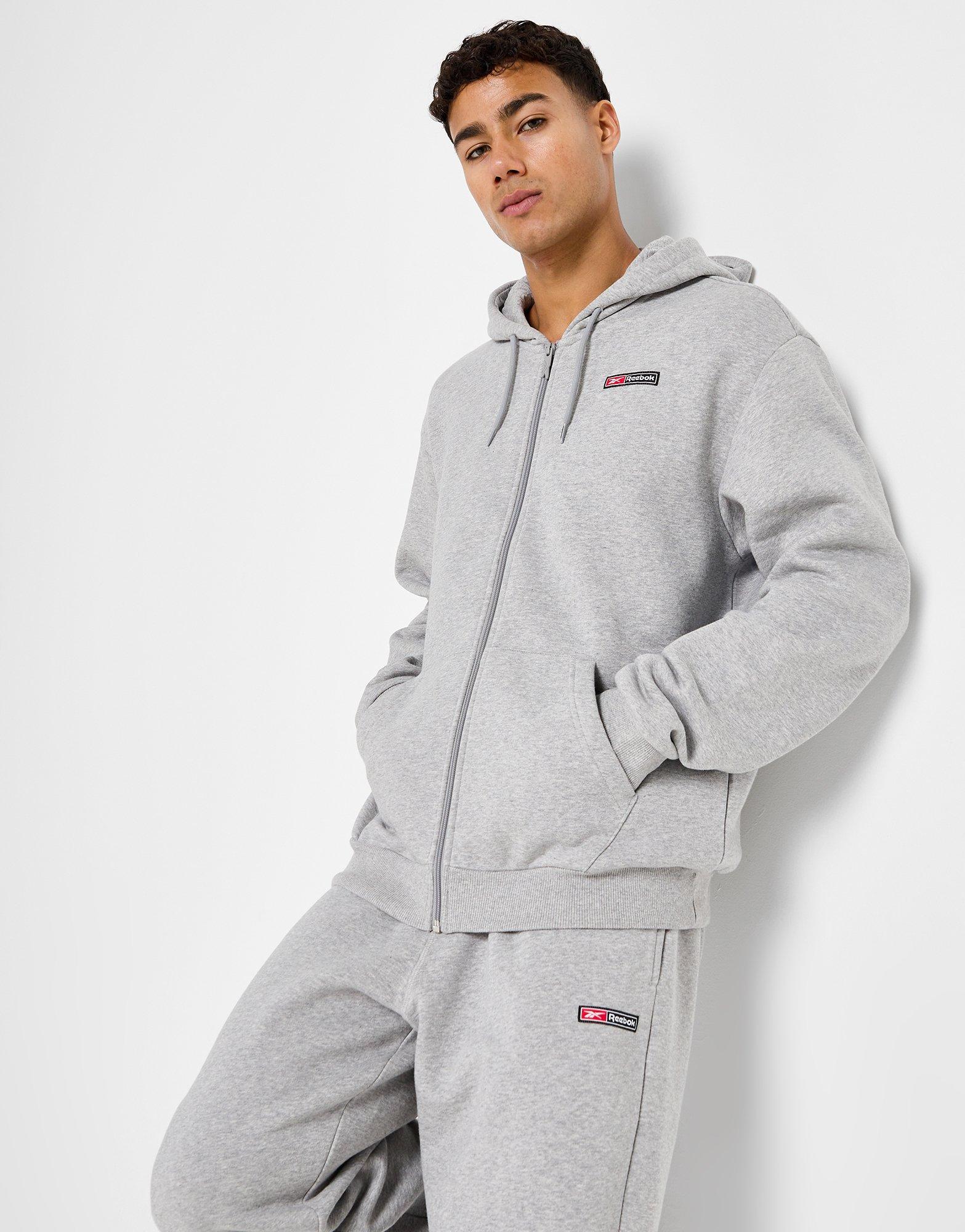 Reebok Sweat à Capuche Zippé Woven Homme