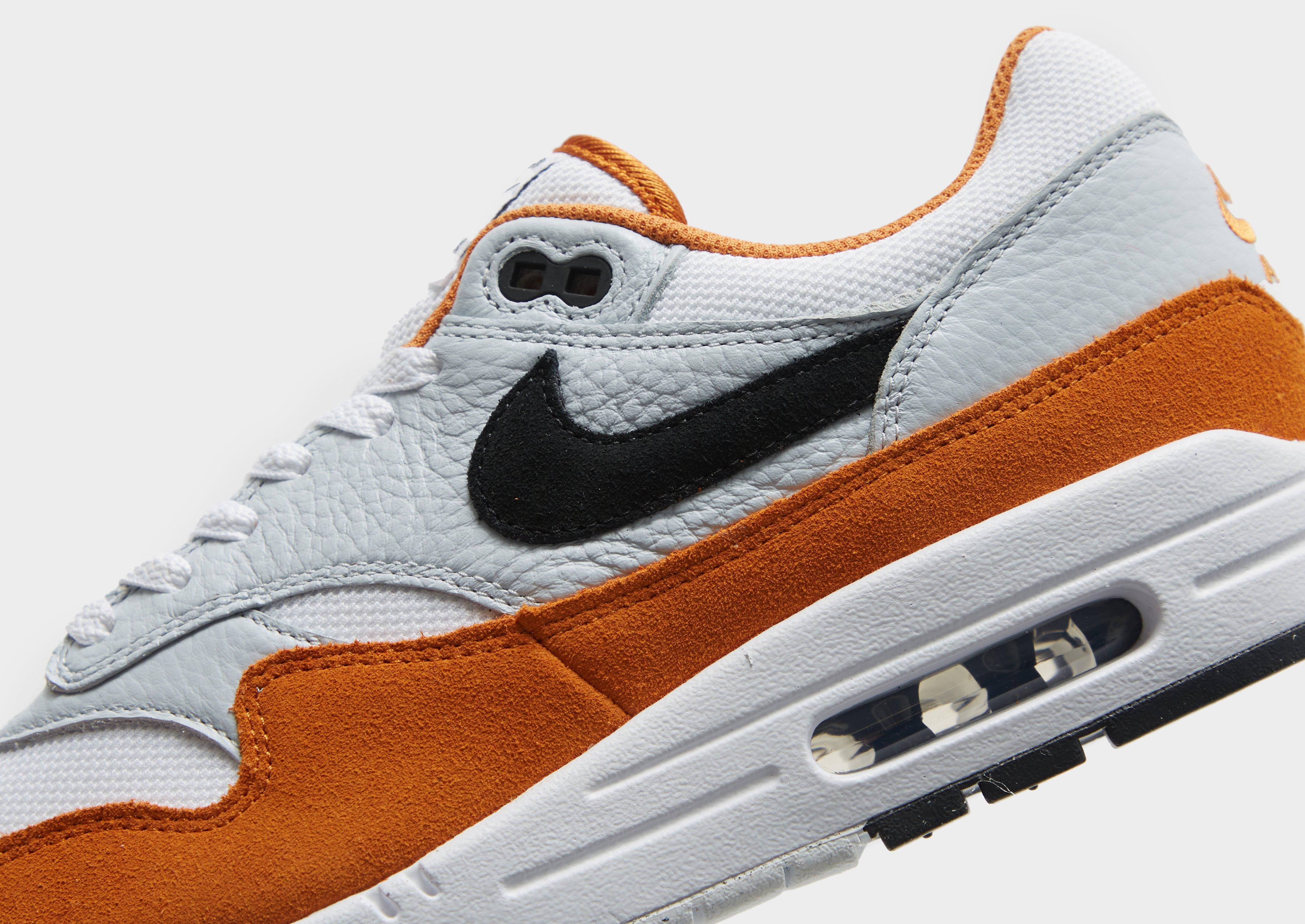 Nike air max 1 zwart oranje hotsell