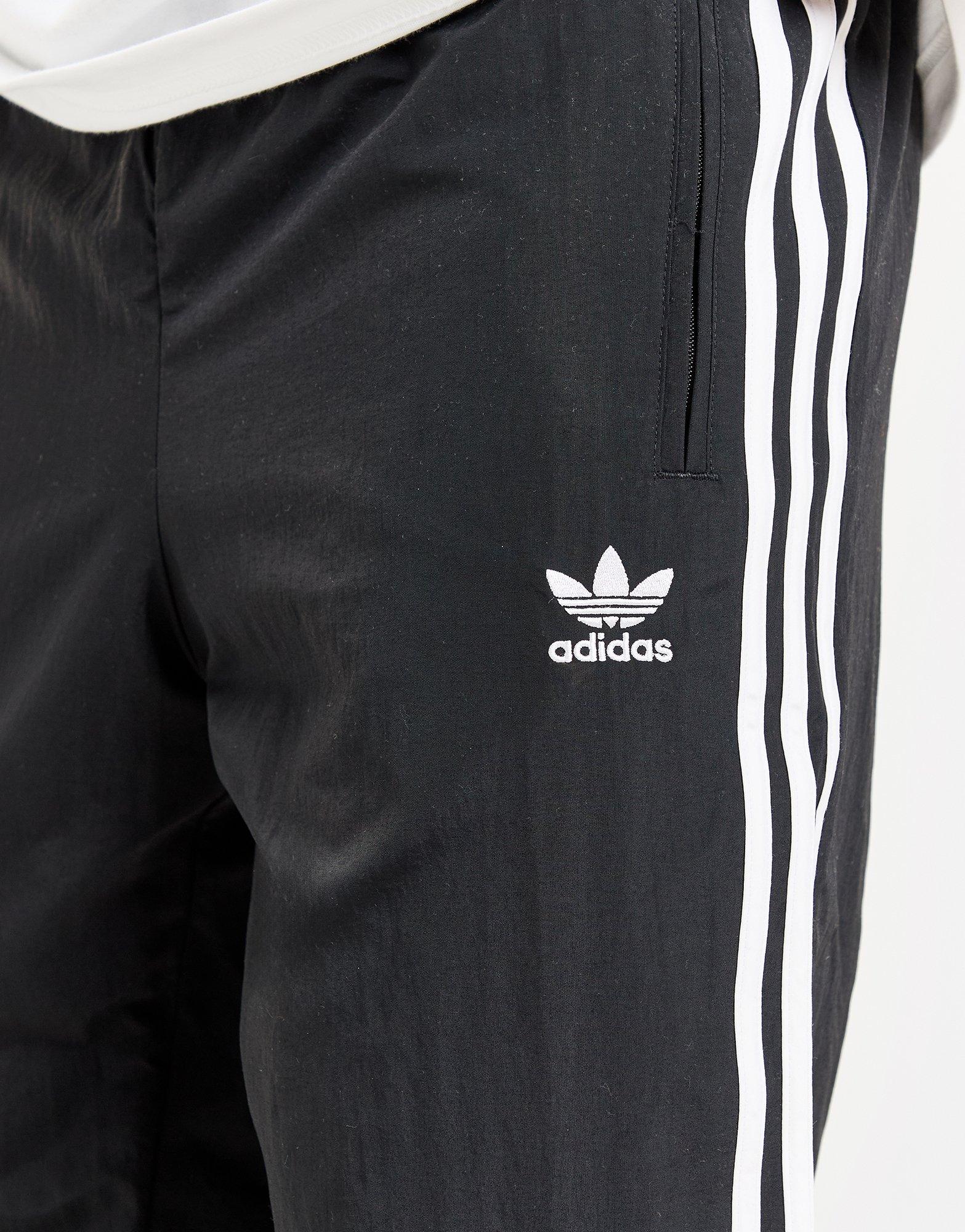 Black adidas Originals Woven Firebird Track Pants - JD Black adidas Originals Woven Firebird Track Pants - JD