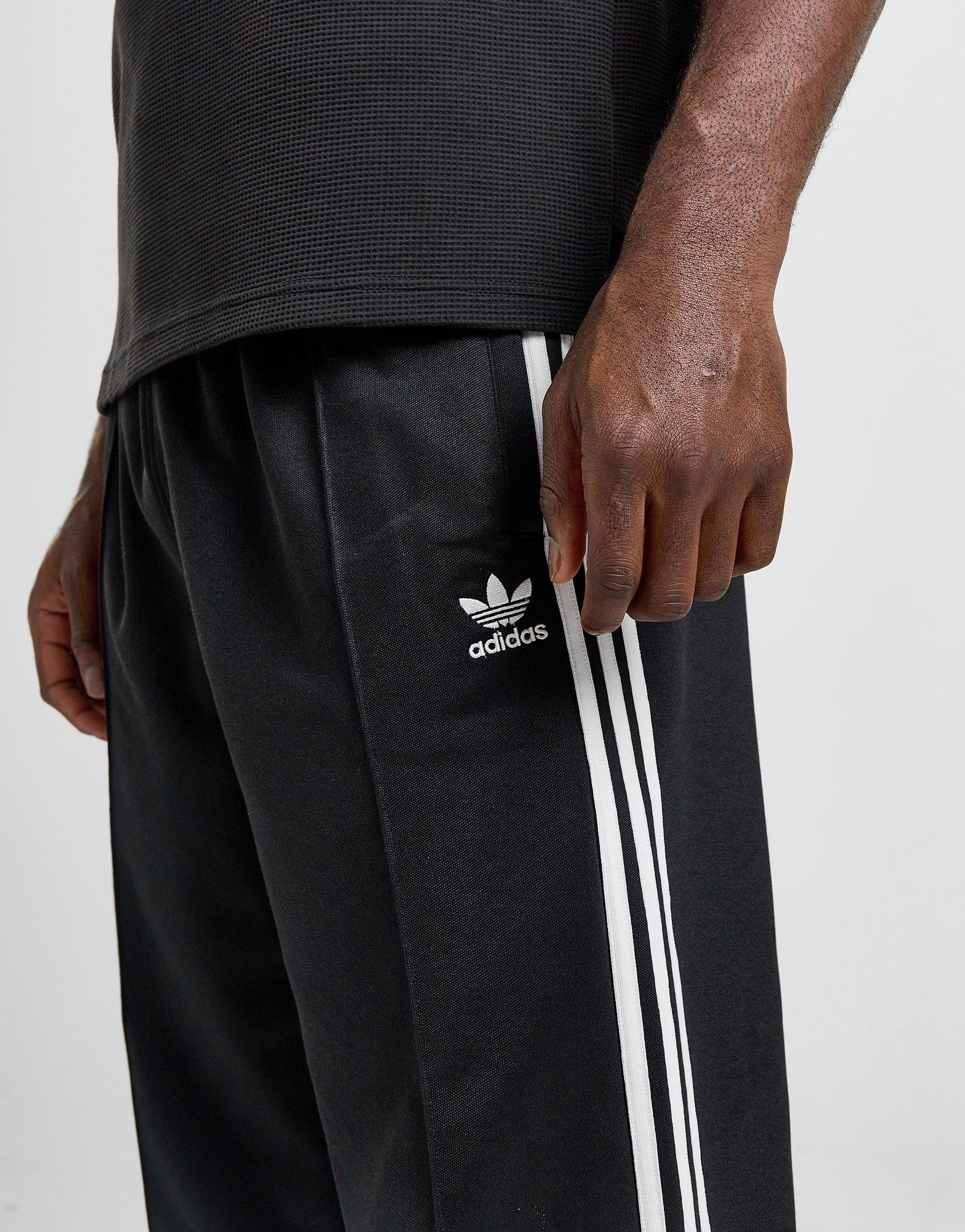 adidas Originals Pantaloni Firebird Baggy Adicolor in Nero JD Sports