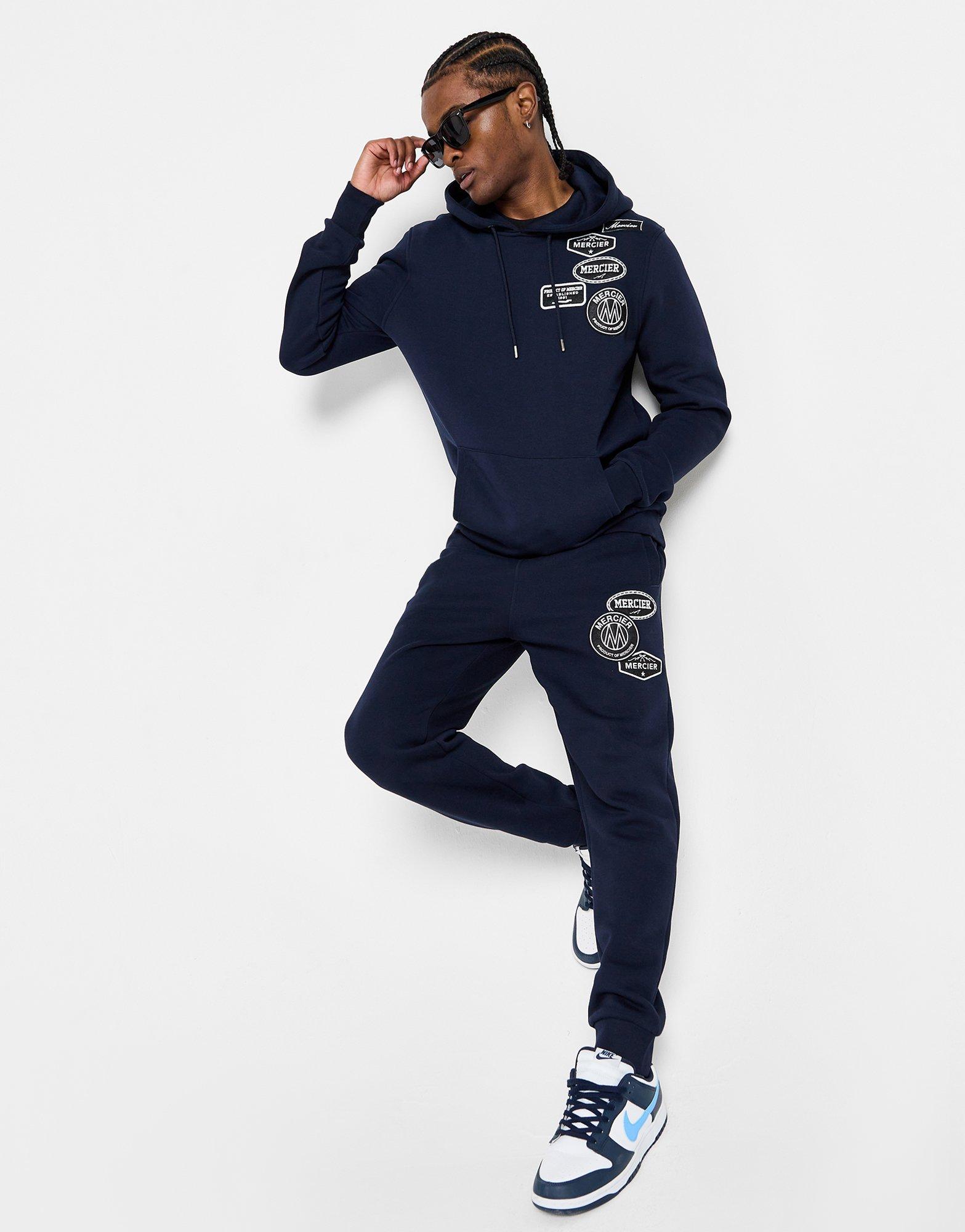 Blue MERCIER Mono Badge Joggers | JD Sports UK