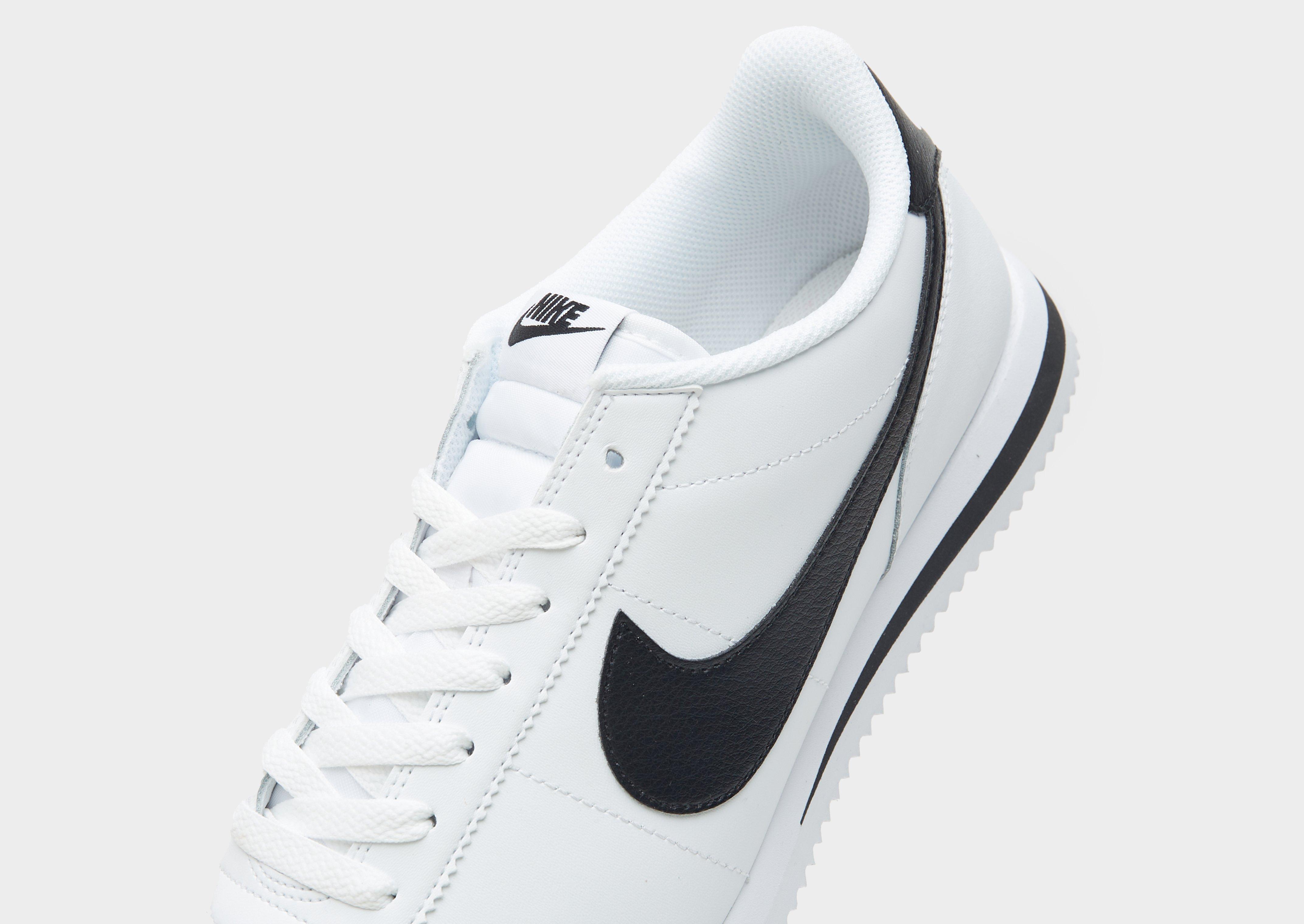 Mens all white nike cortez online