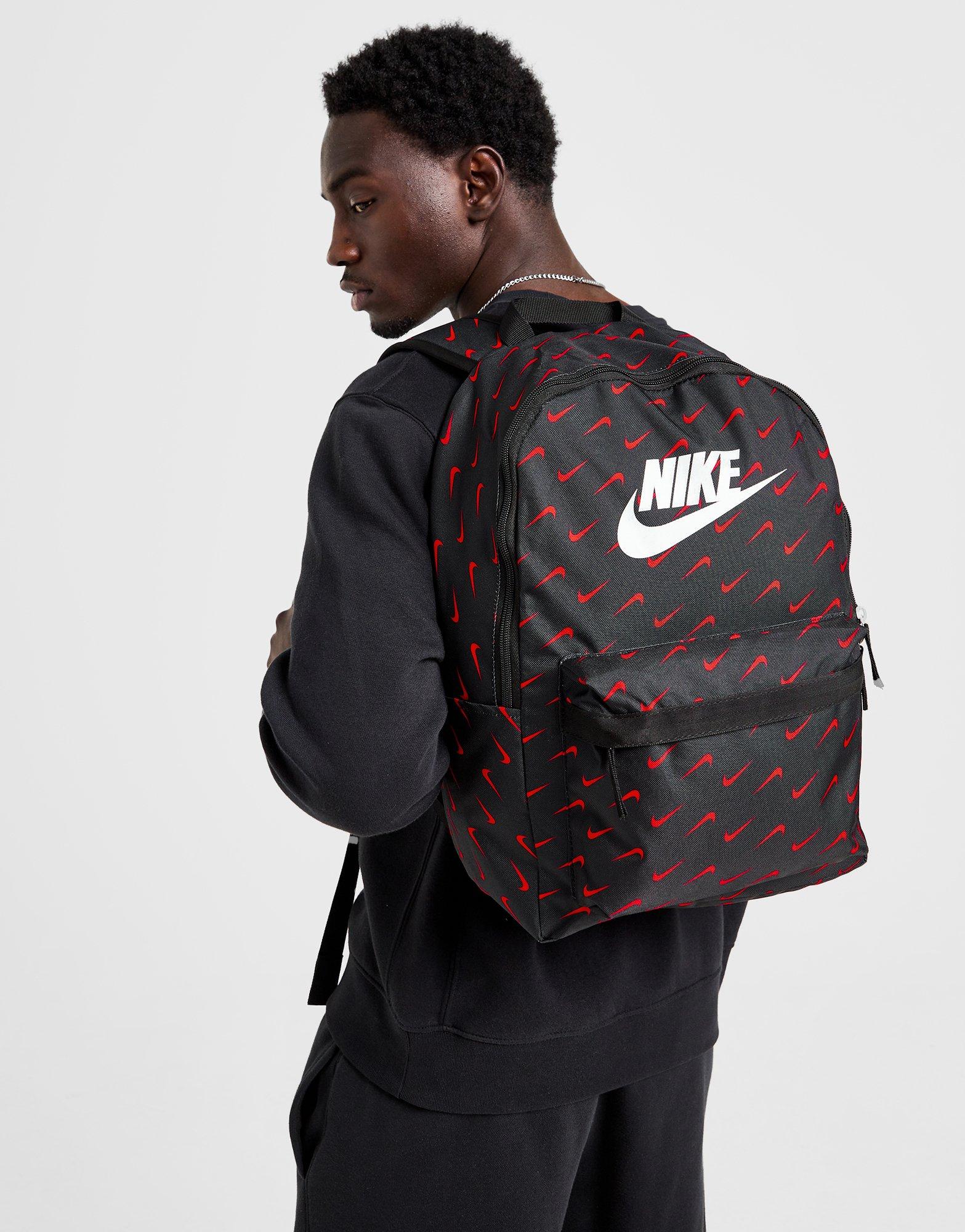 Pink and grey nike backpack on sale