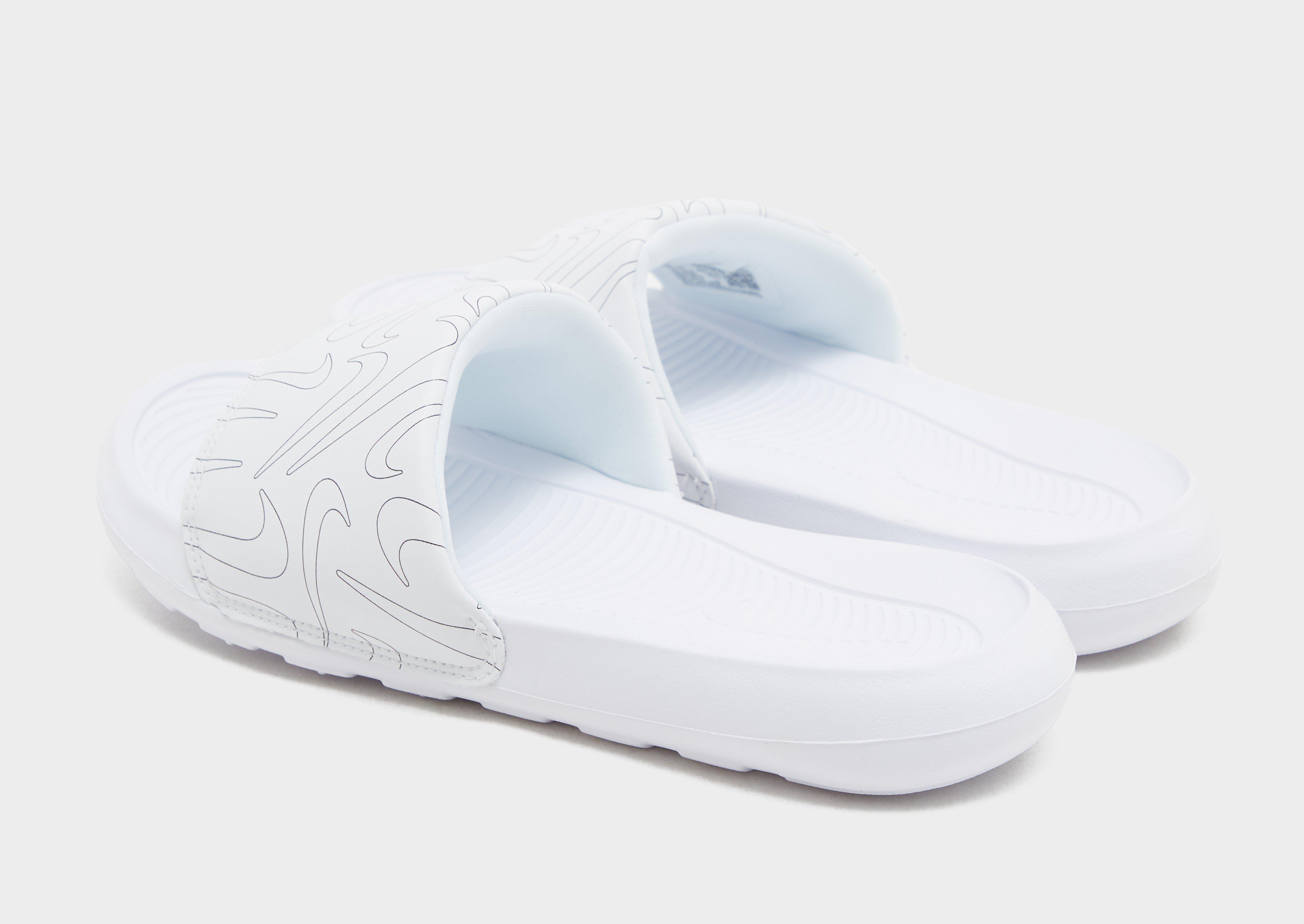 All white nike slides online