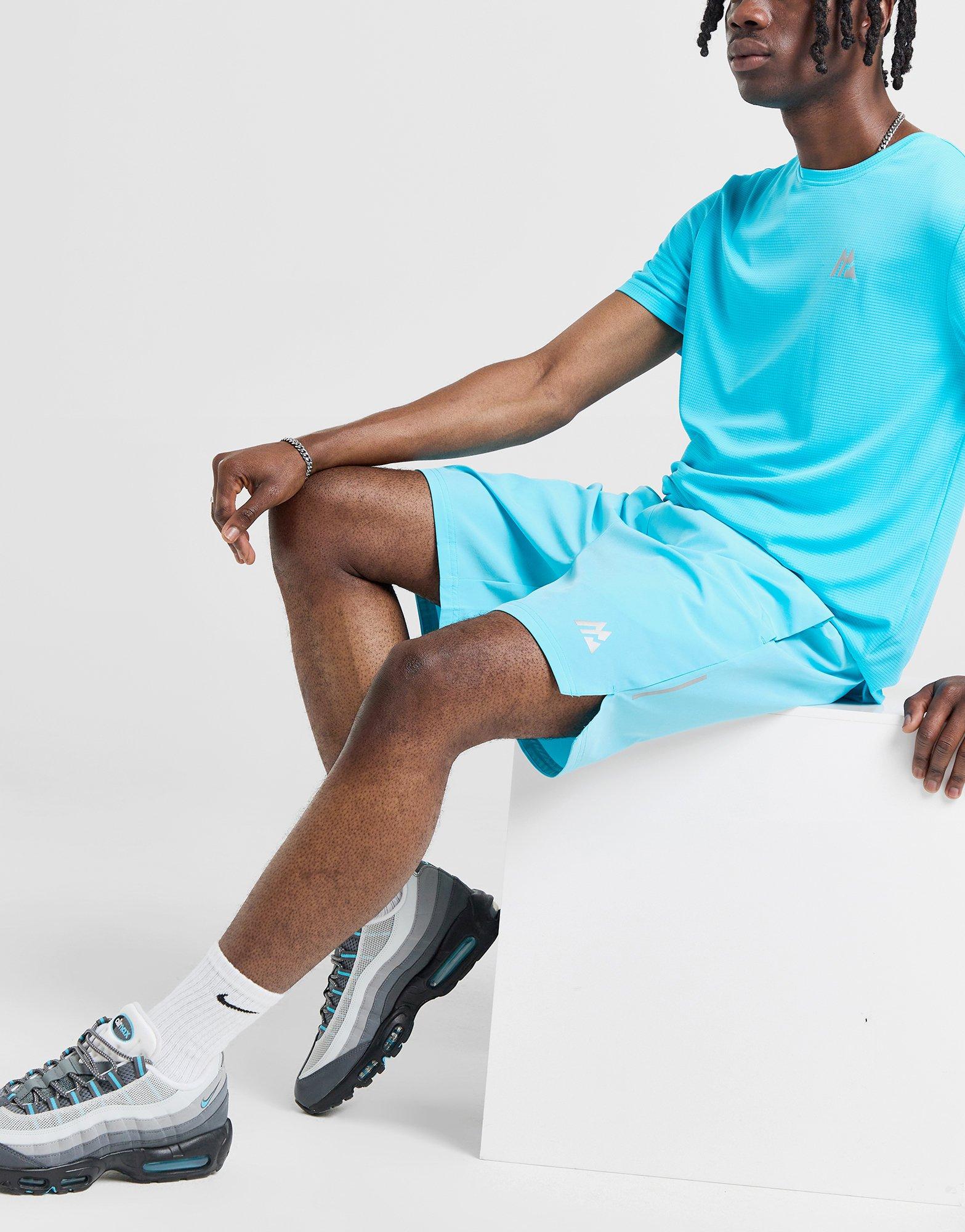 Blue and green shorts shop