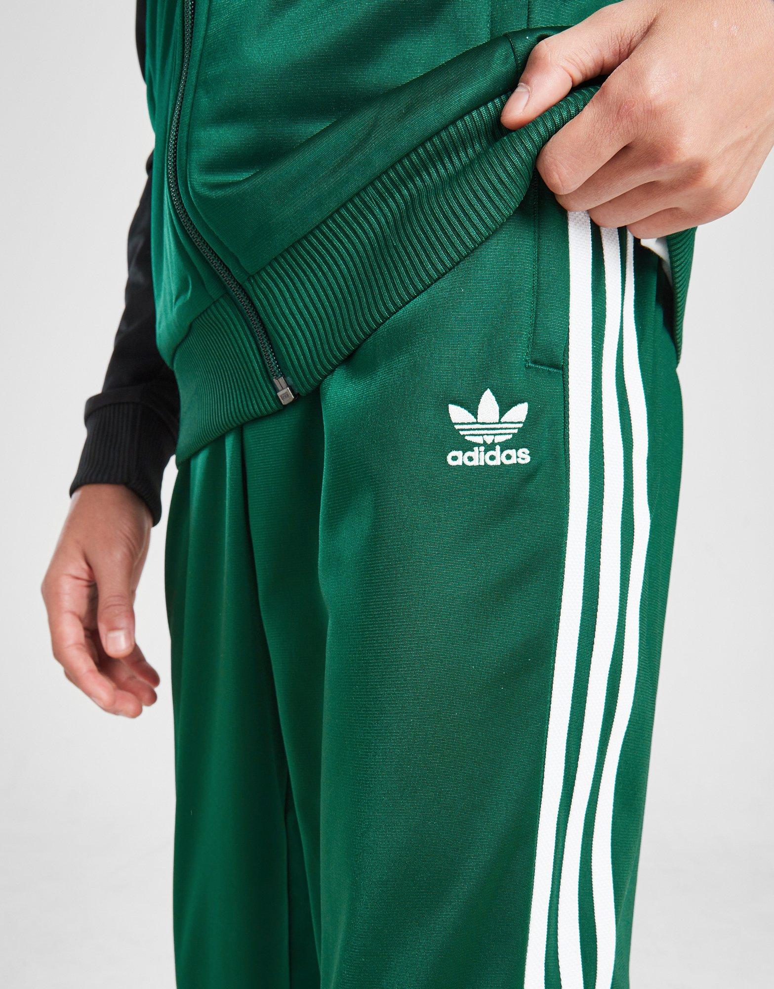 Olive green adidas track pants best sale