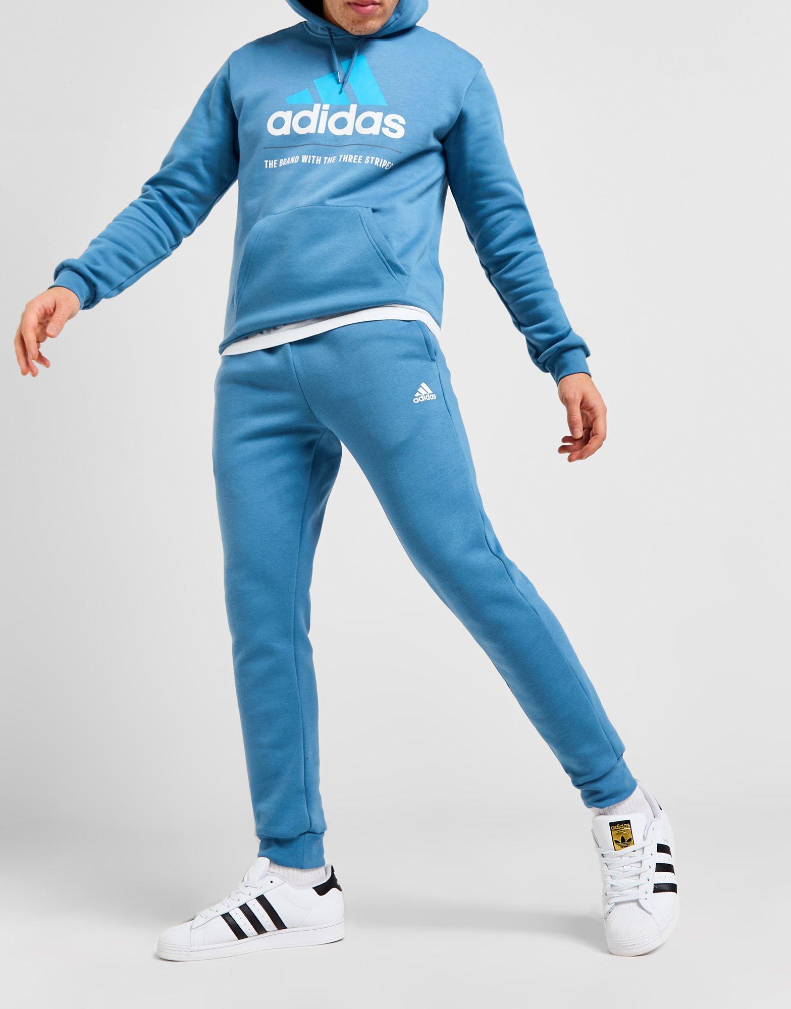 Adidas big logo discount track pants blue