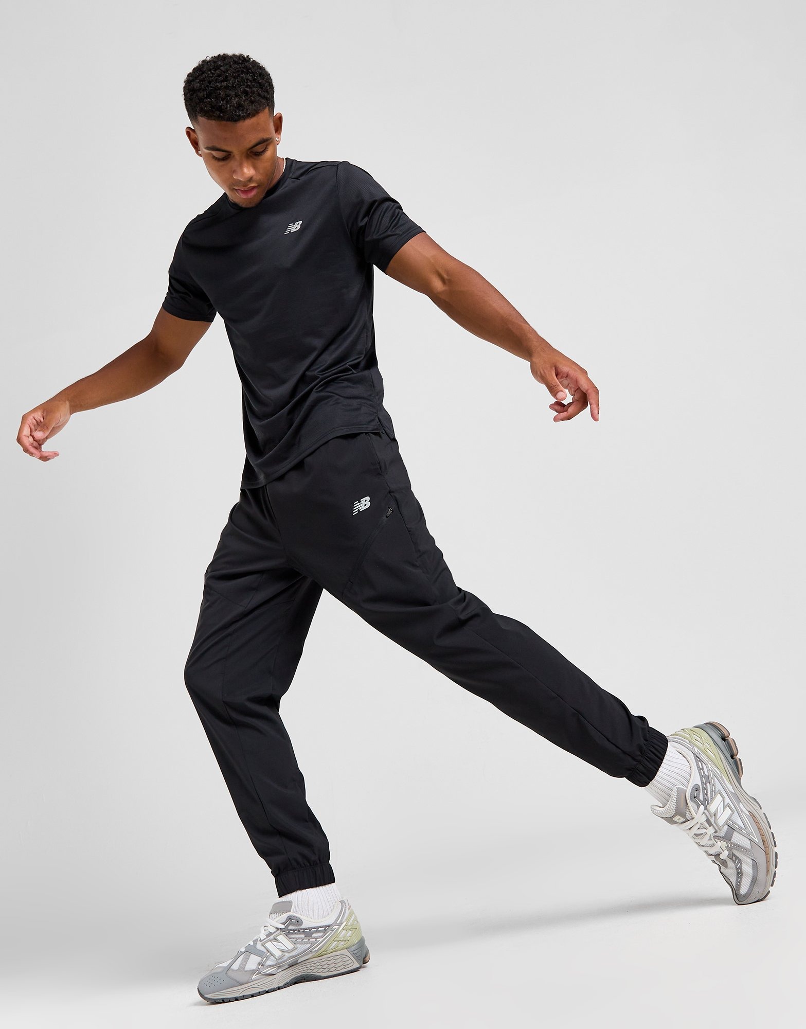 Black New Balance Woven Track Pants JD Sports Ireland