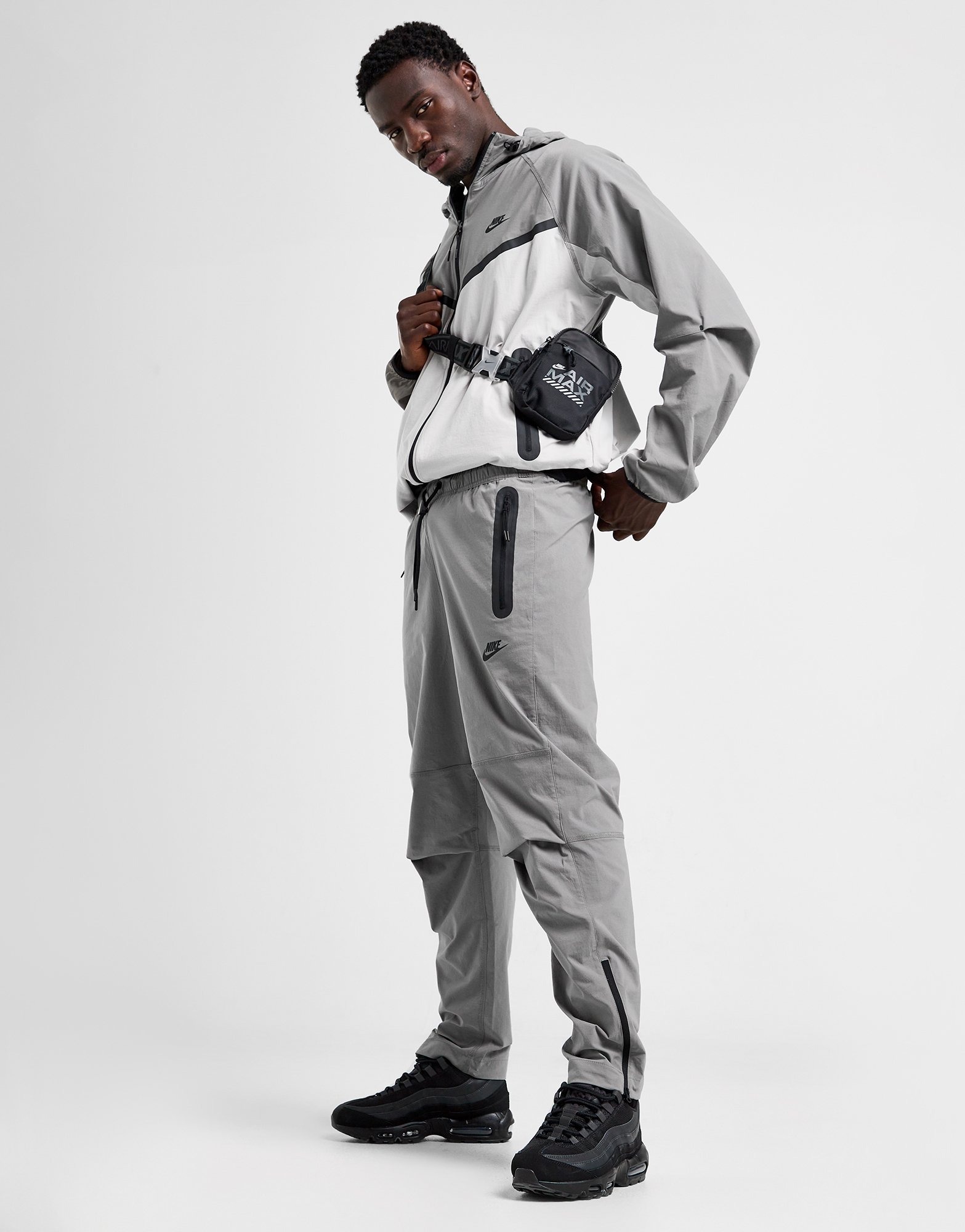 Nike Club Woven Tapered Leg Pants Standard Fit Grey Mens