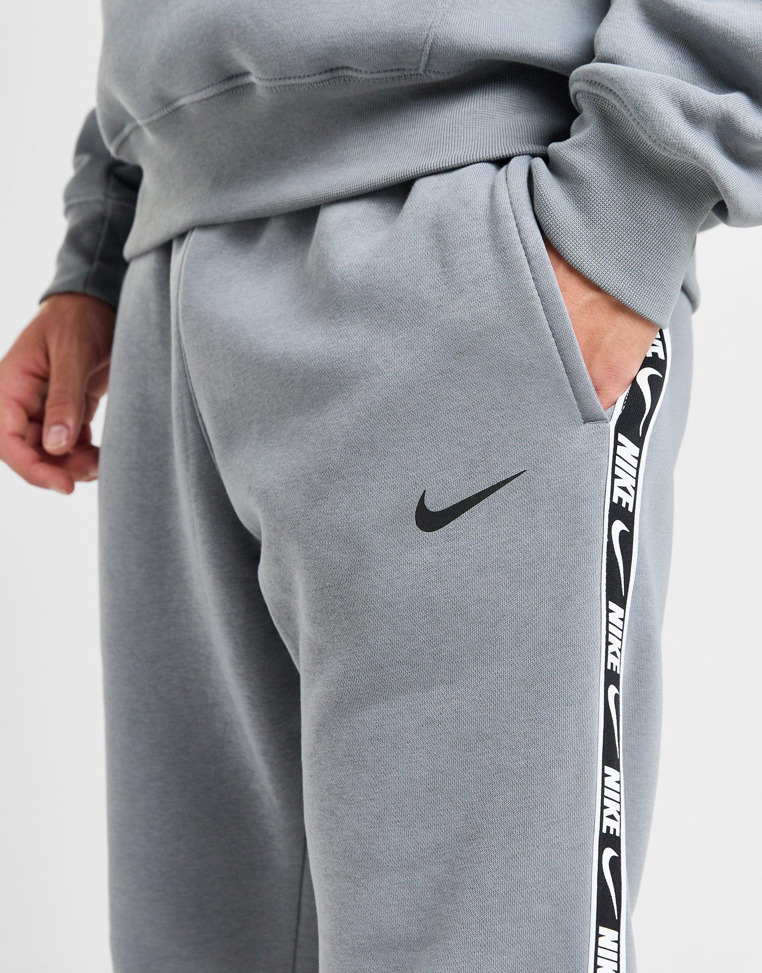 Nike grey tape joggers outlet
