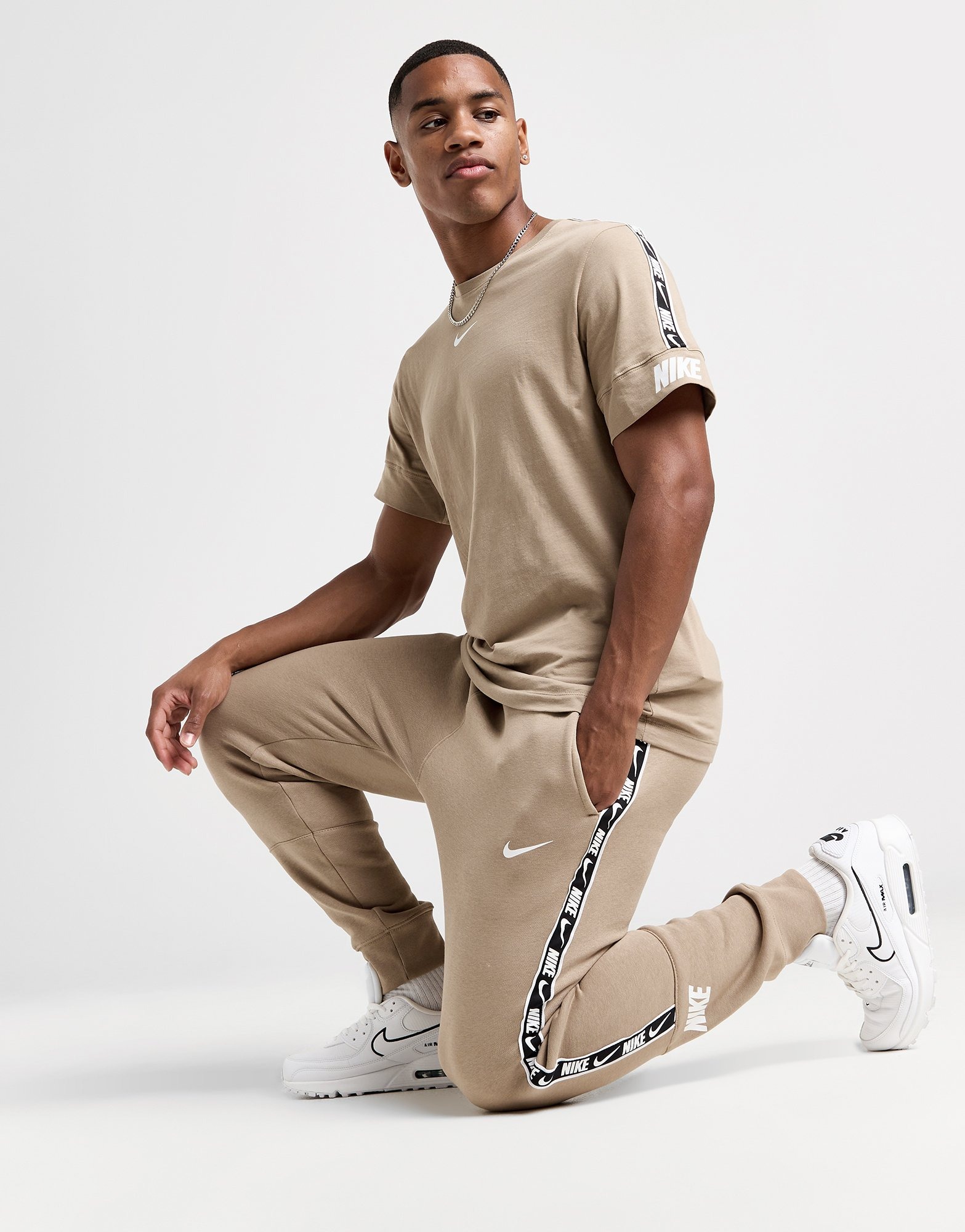 Nike beige joggers online