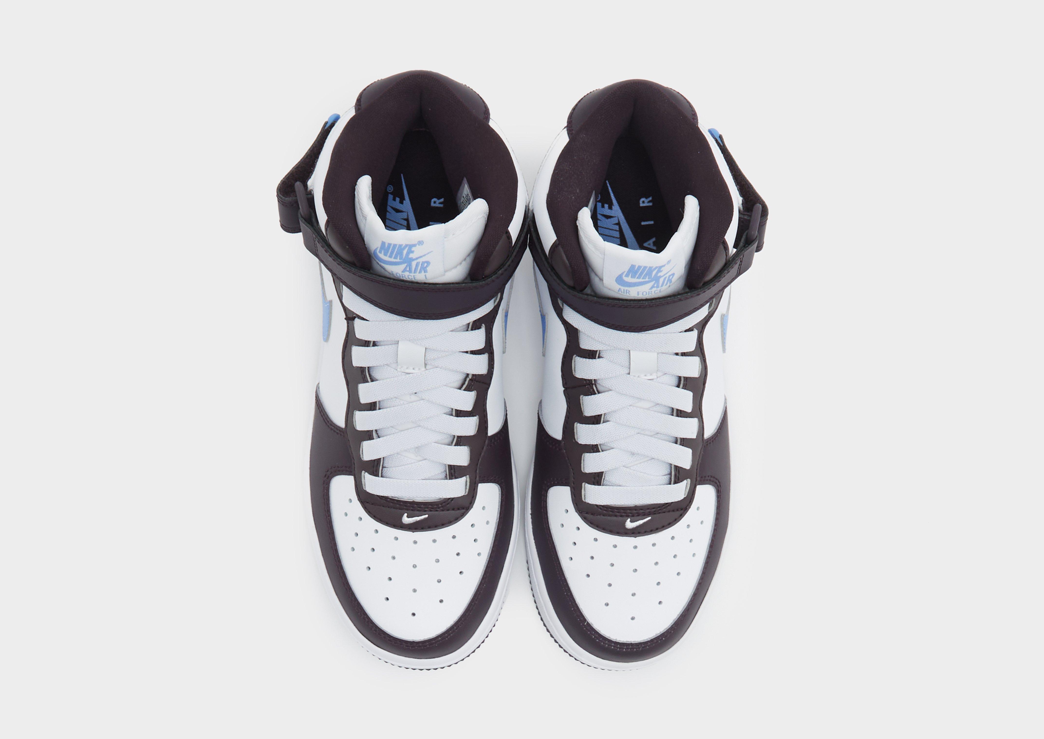 Nike air force mid junior deals