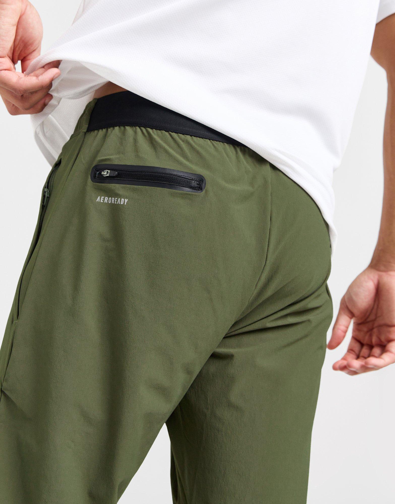 Green adidas Tech Woven Track Pants - JD Sports Global