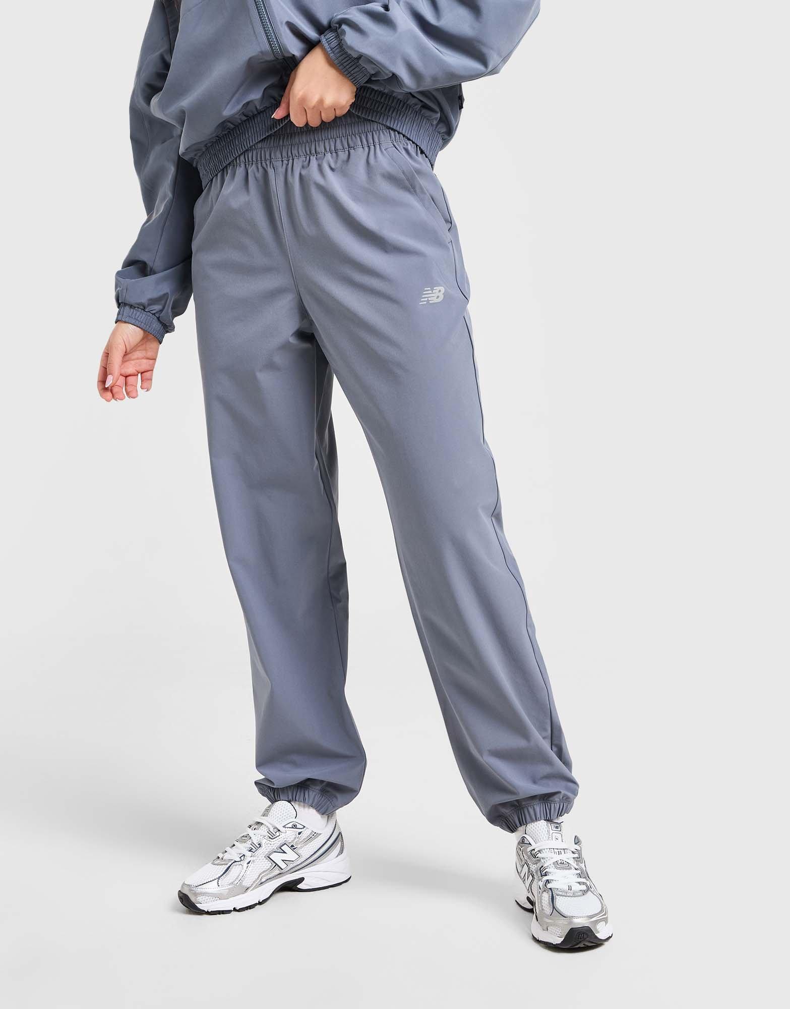 New Balance Calças de Fato de Treino Essential Logo Woven