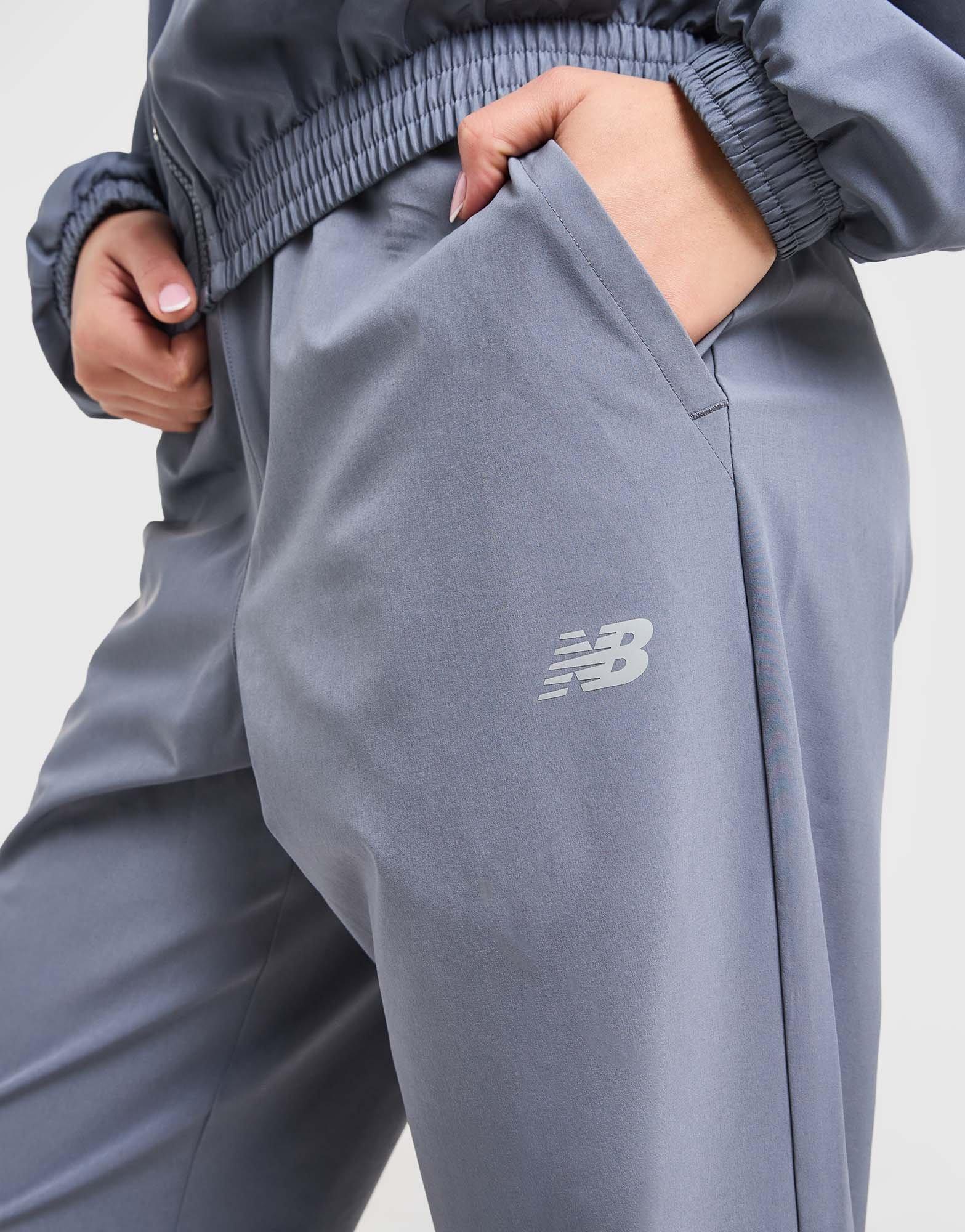 New Balance Calças de Fato de Treino Essential Logo Woven