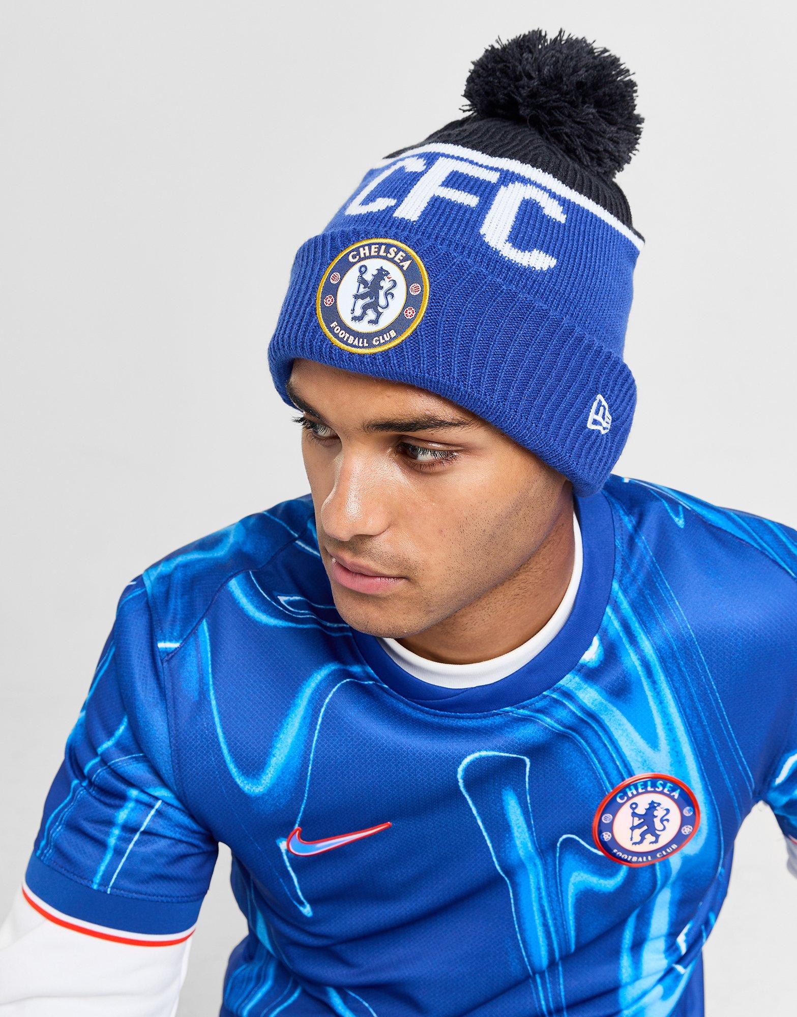 Snow hat with ball on top on sale
