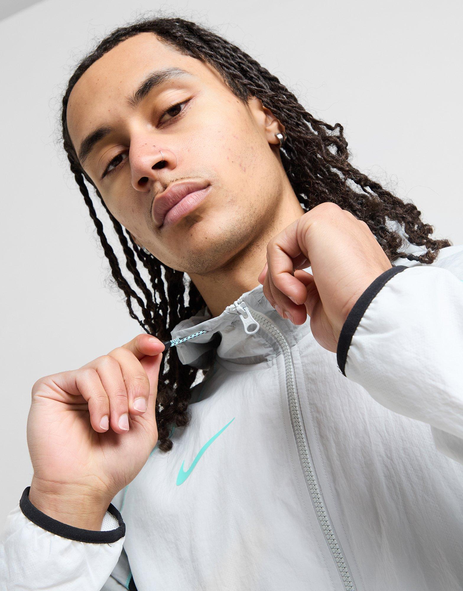 Nike Waterafstotend voetbaljack met capuchon voor heren Strike+