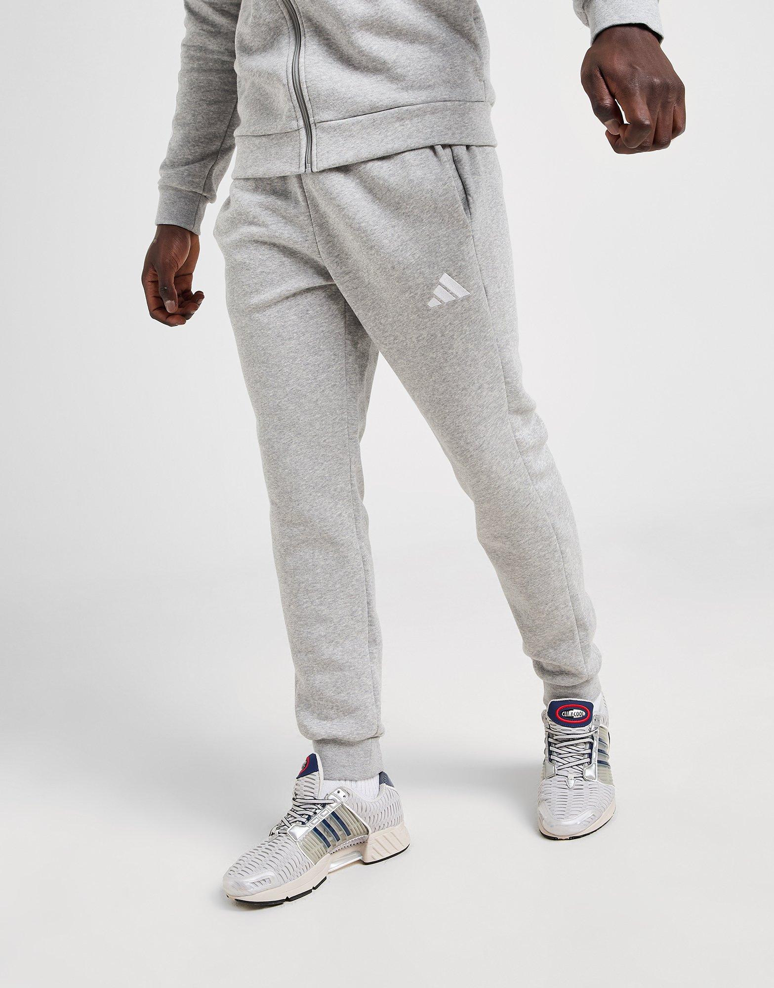 adidas Fleece 3-Streifen Trainingsanzug