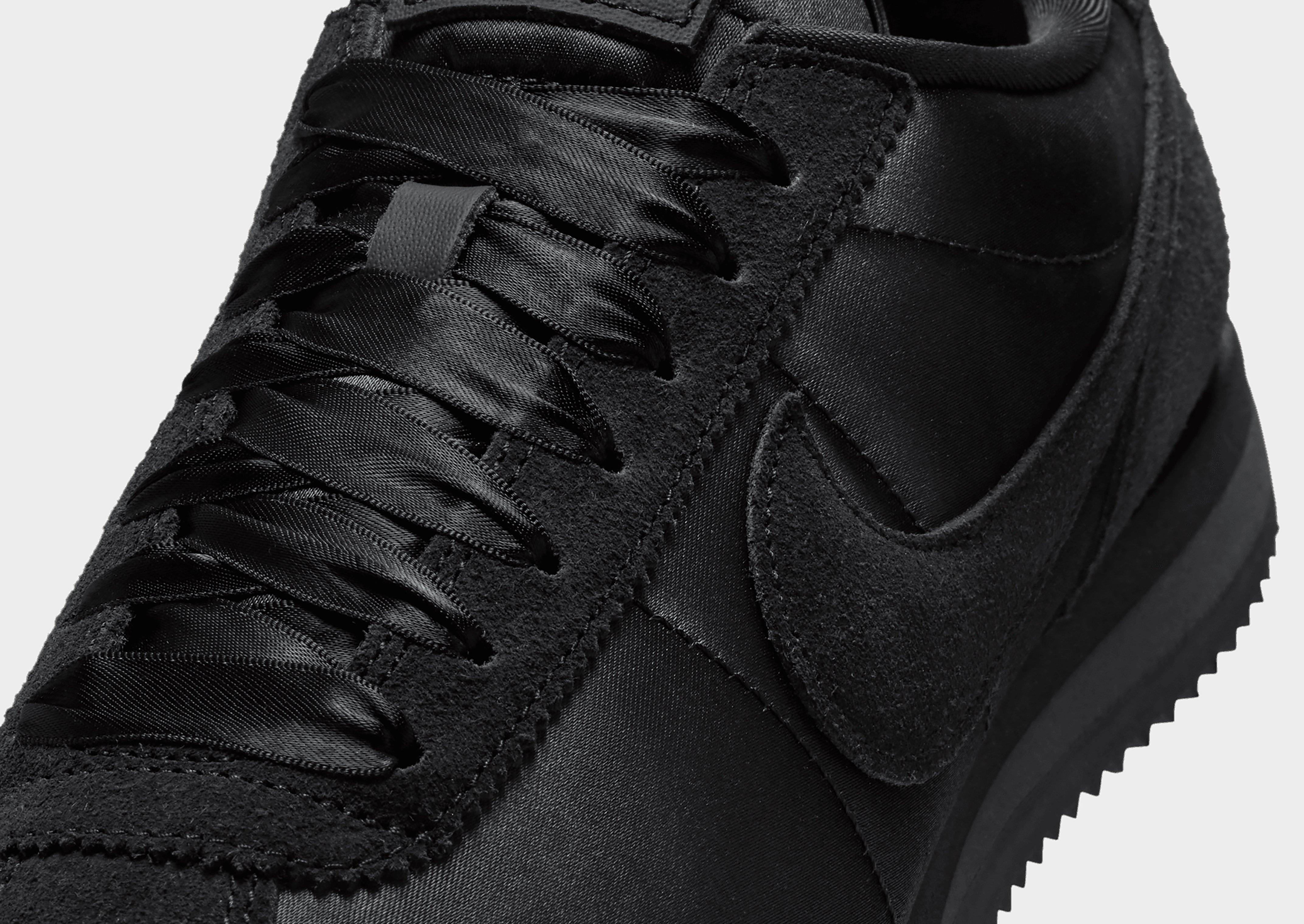 All black nylon cortez on sale