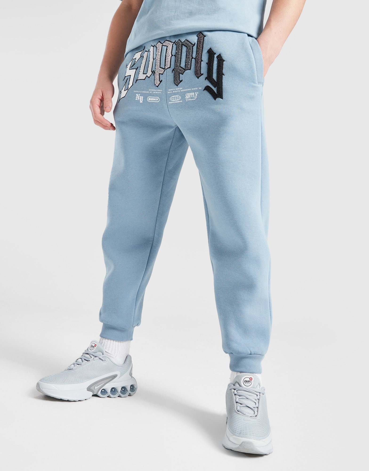 jd sports junior white trainers