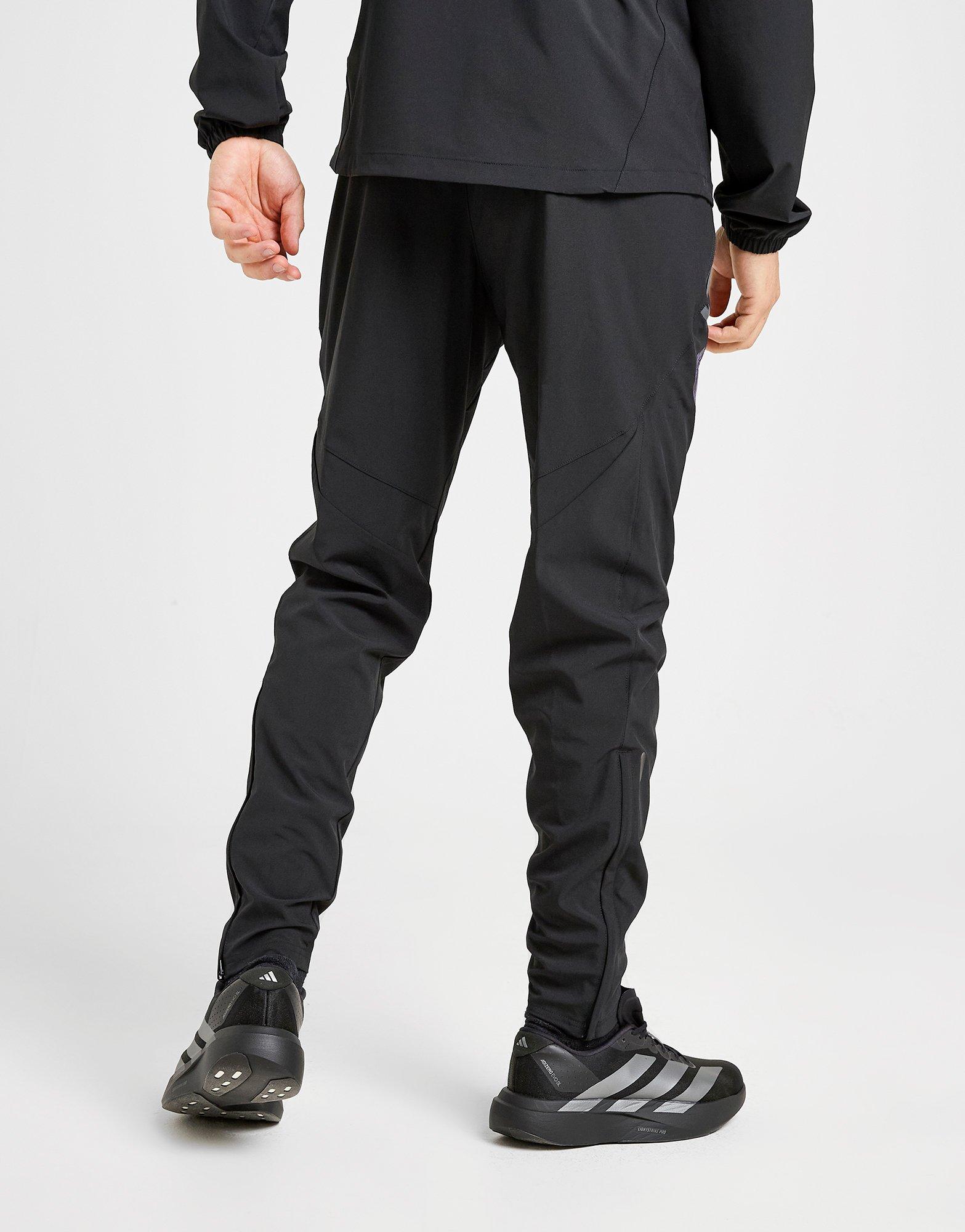 adidas Manchester United Tiro 25 Competition Vis Tech Pantalon de voyage