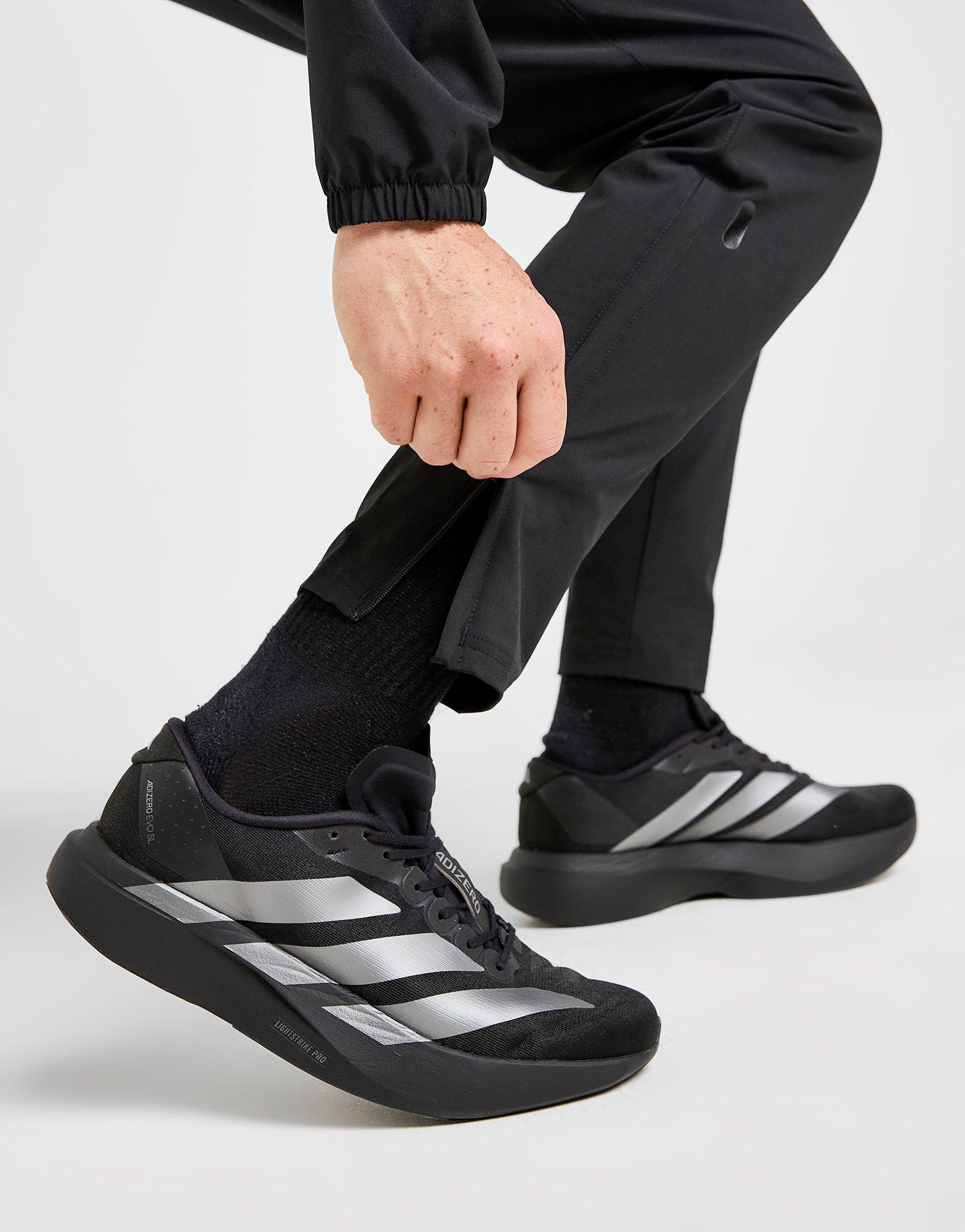 adidas Manchester United Tiro 25 Competition Vis Tech Pantalon de voyage