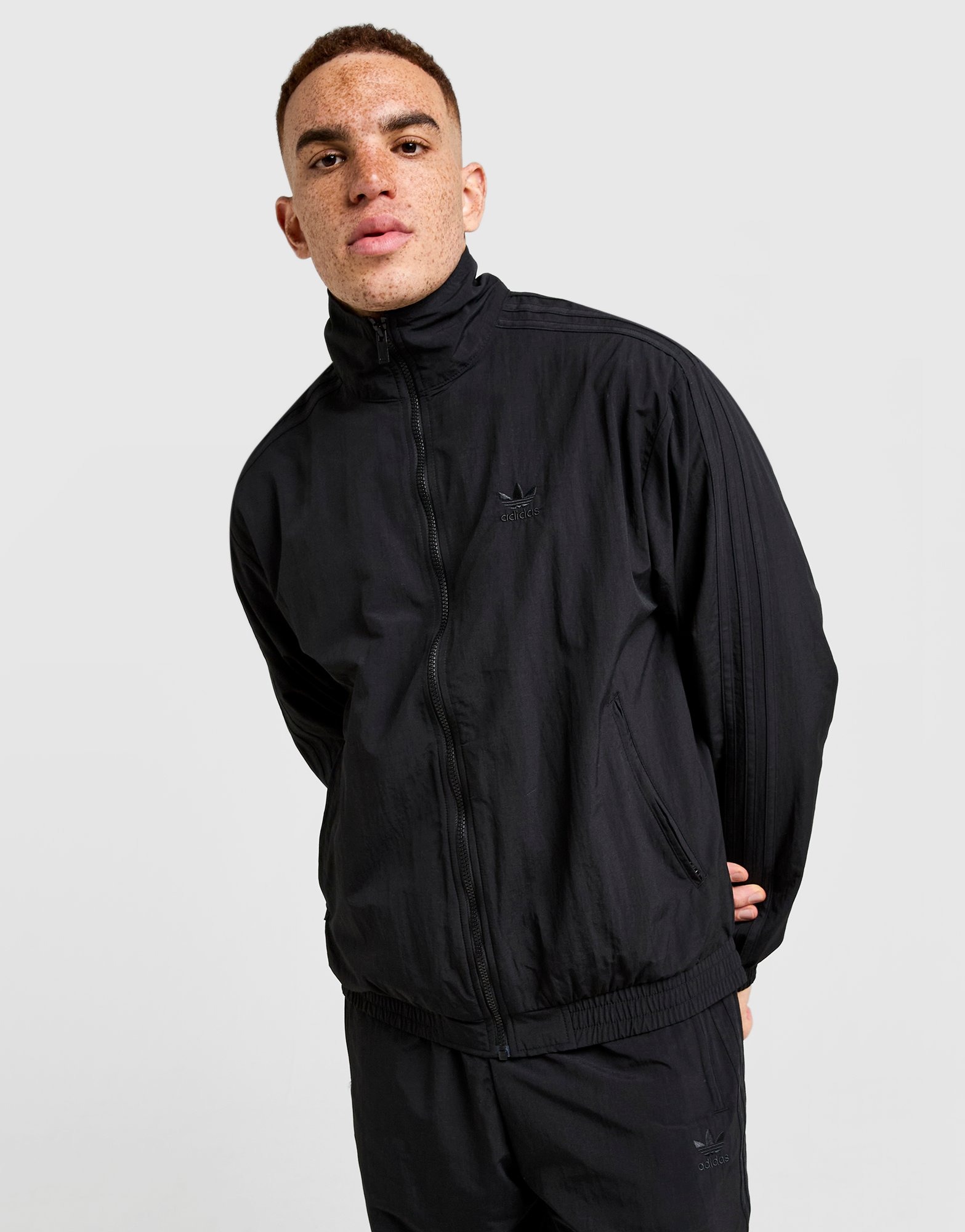 Black adidas Originals Woven Firebird Track Top - JD Sports Global