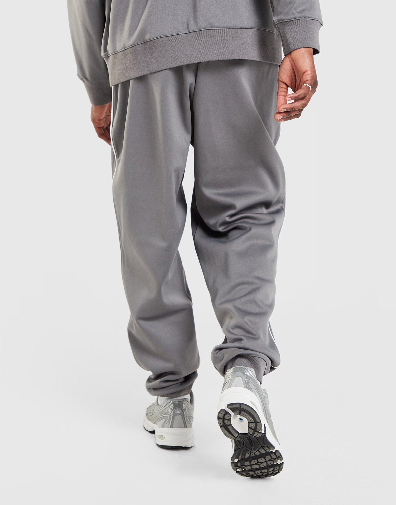 New Balance Apres Poly Track Pants