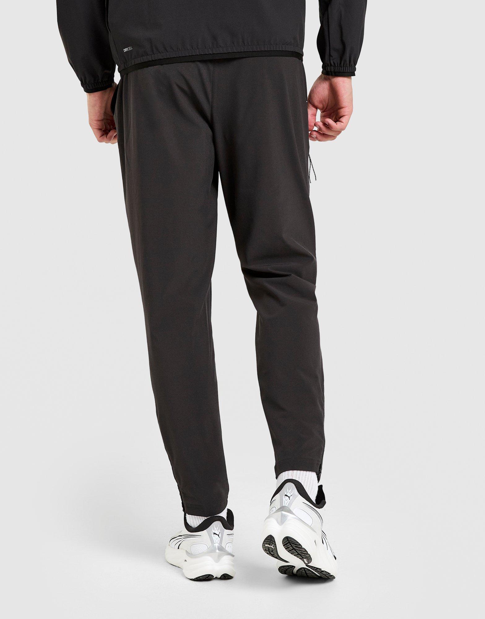PUMA Flex Stretch Woven Track Pants