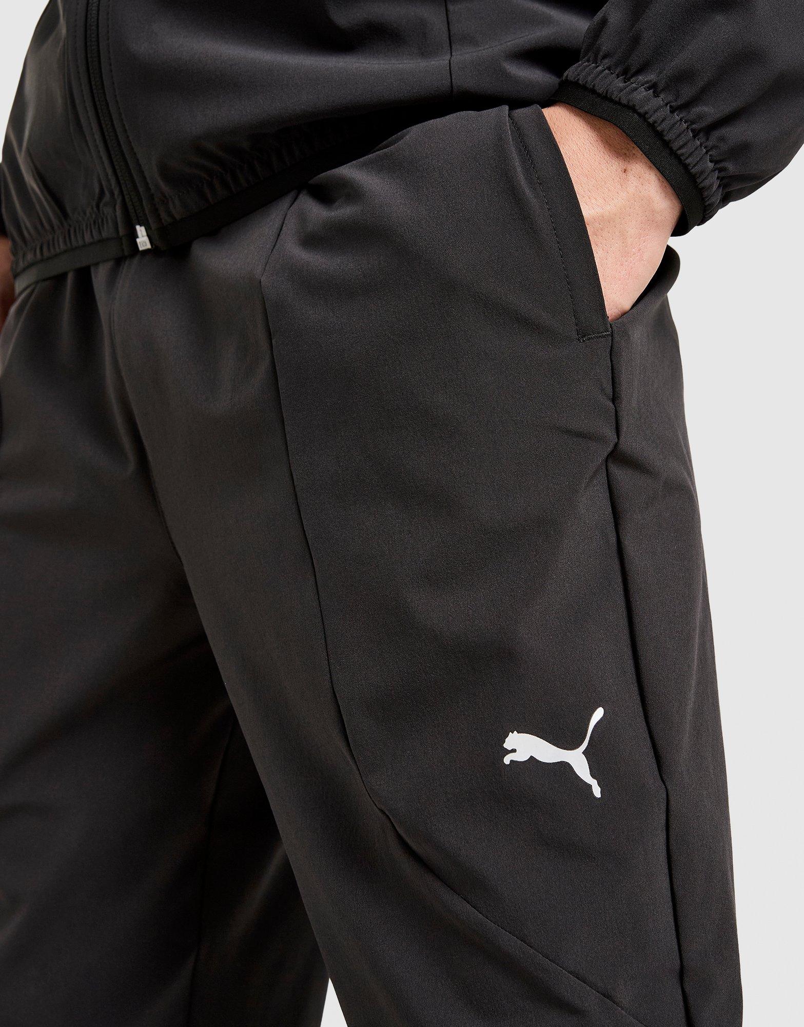 PUMA Flex Stretch Woven Track Pants