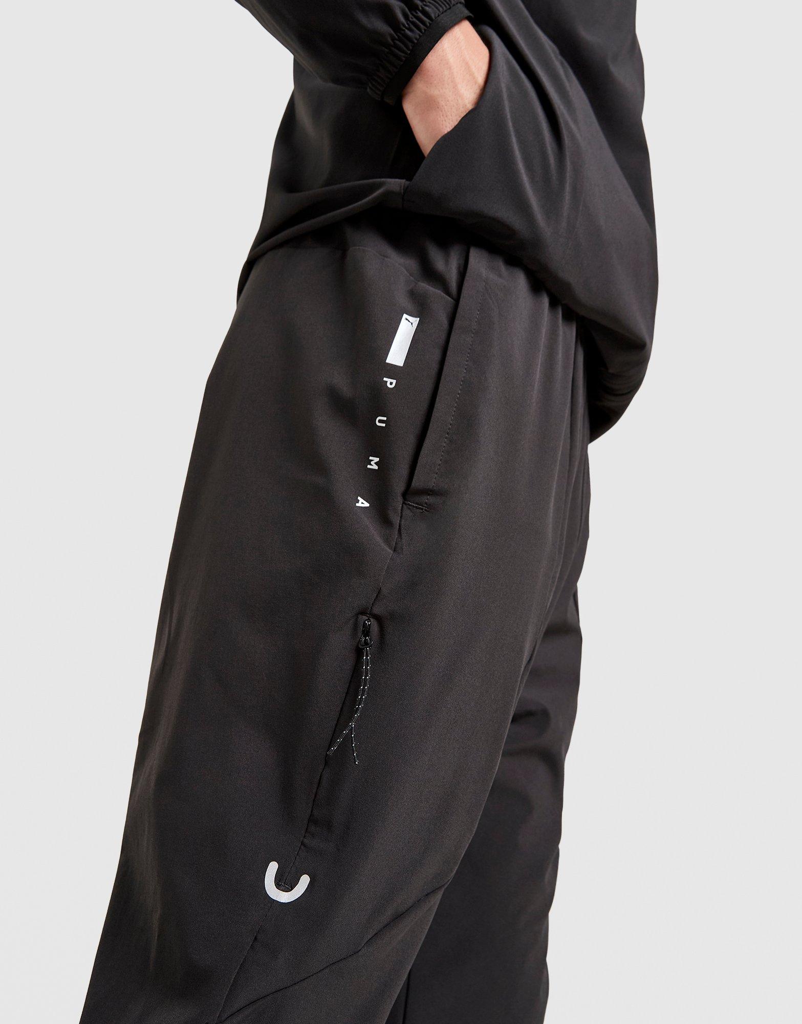 PUMA Flex Stretch Woven Track Pants