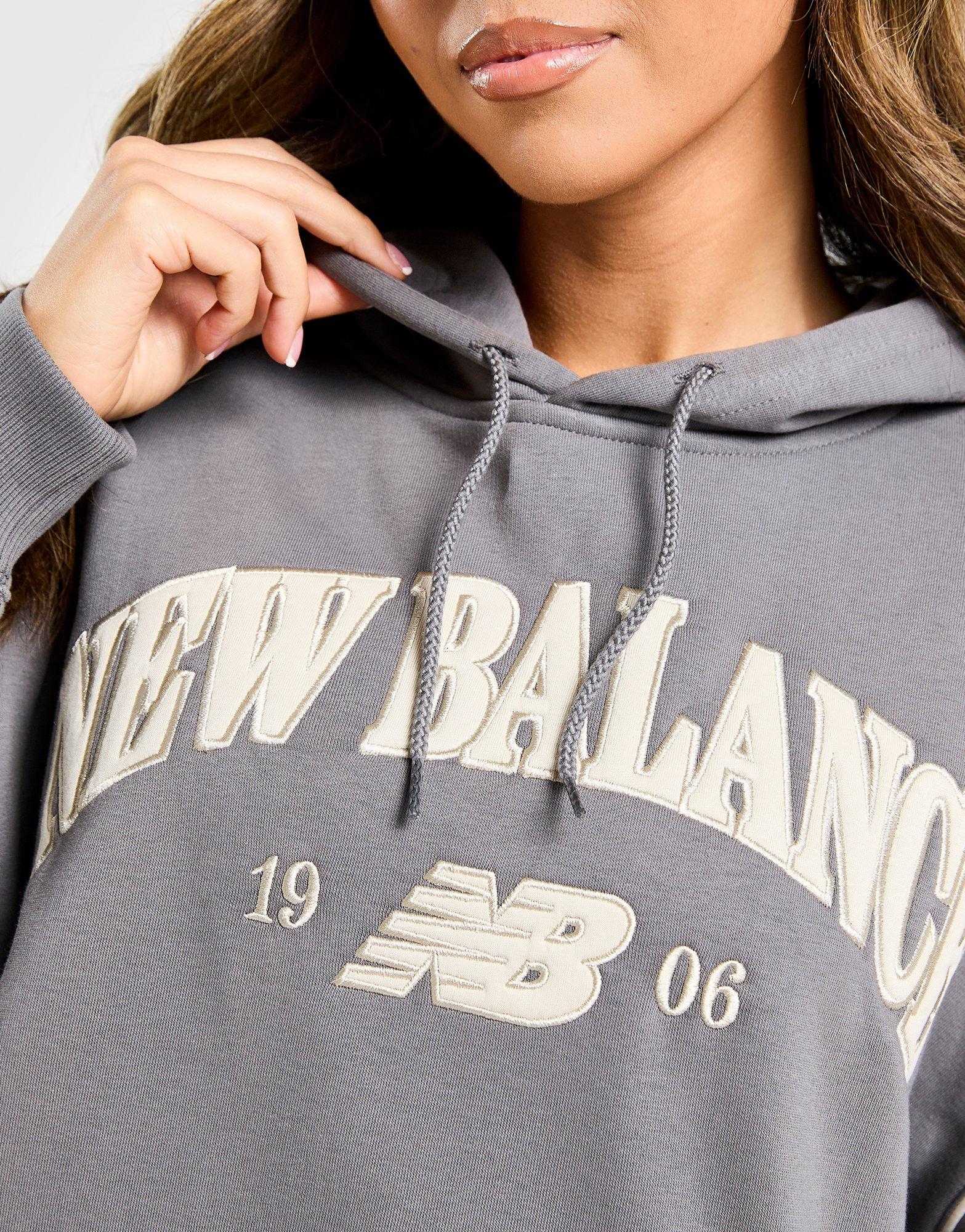 New Balance Sweat à capuche Varsity