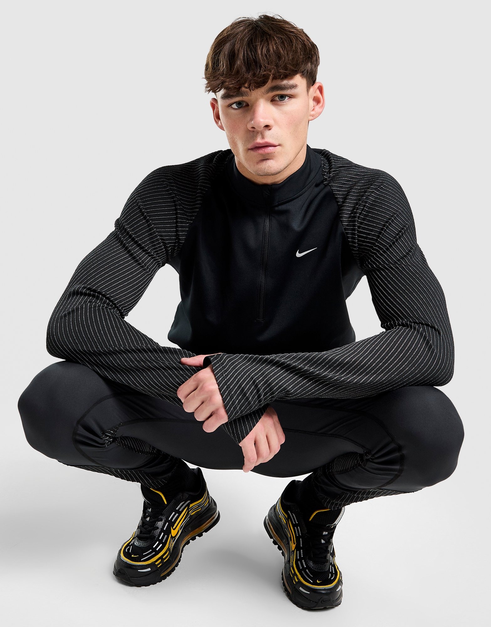 Nike Haut de running zippé 1/4 réfléchissant Noir- JD Sports France