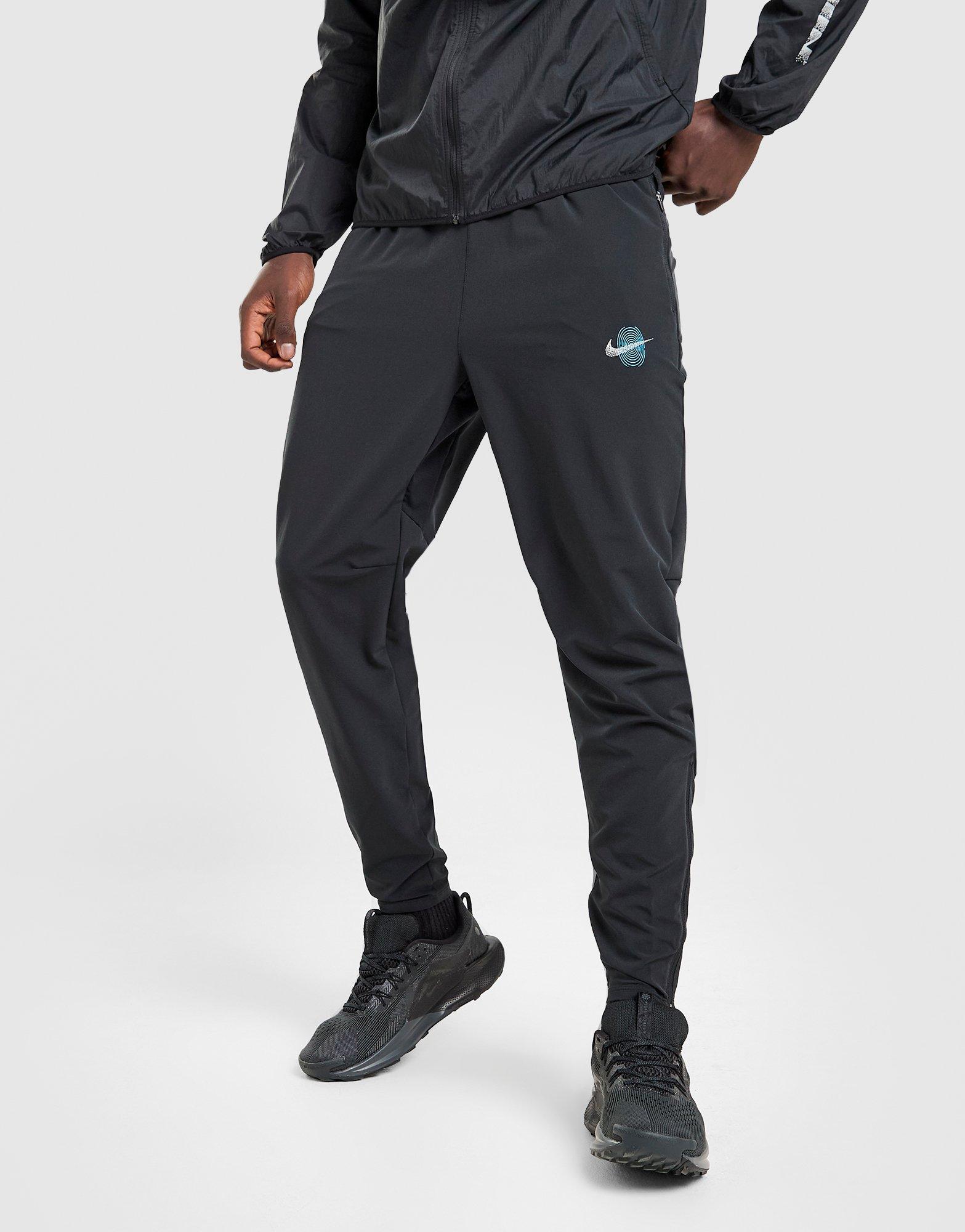 Nike Pantaloni Track Woven Graphic Stride
