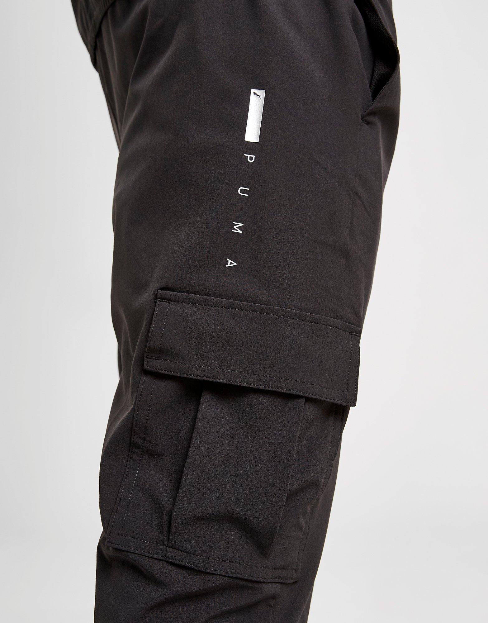 PUMA Flex Woven Track Pants