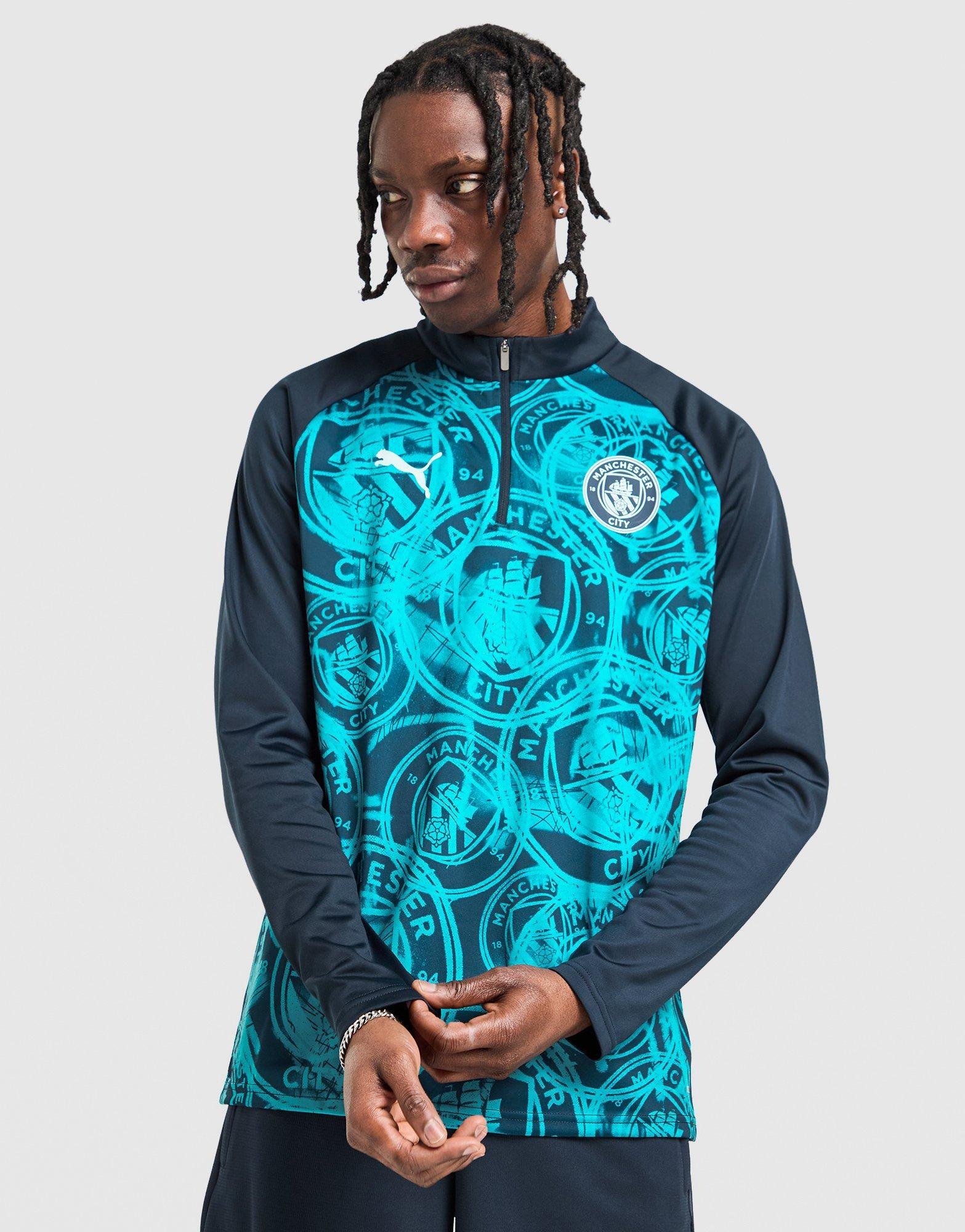 Blue PUMA Manchester City FC Warm Up 1/4 Zip Top | JD Sports UK
