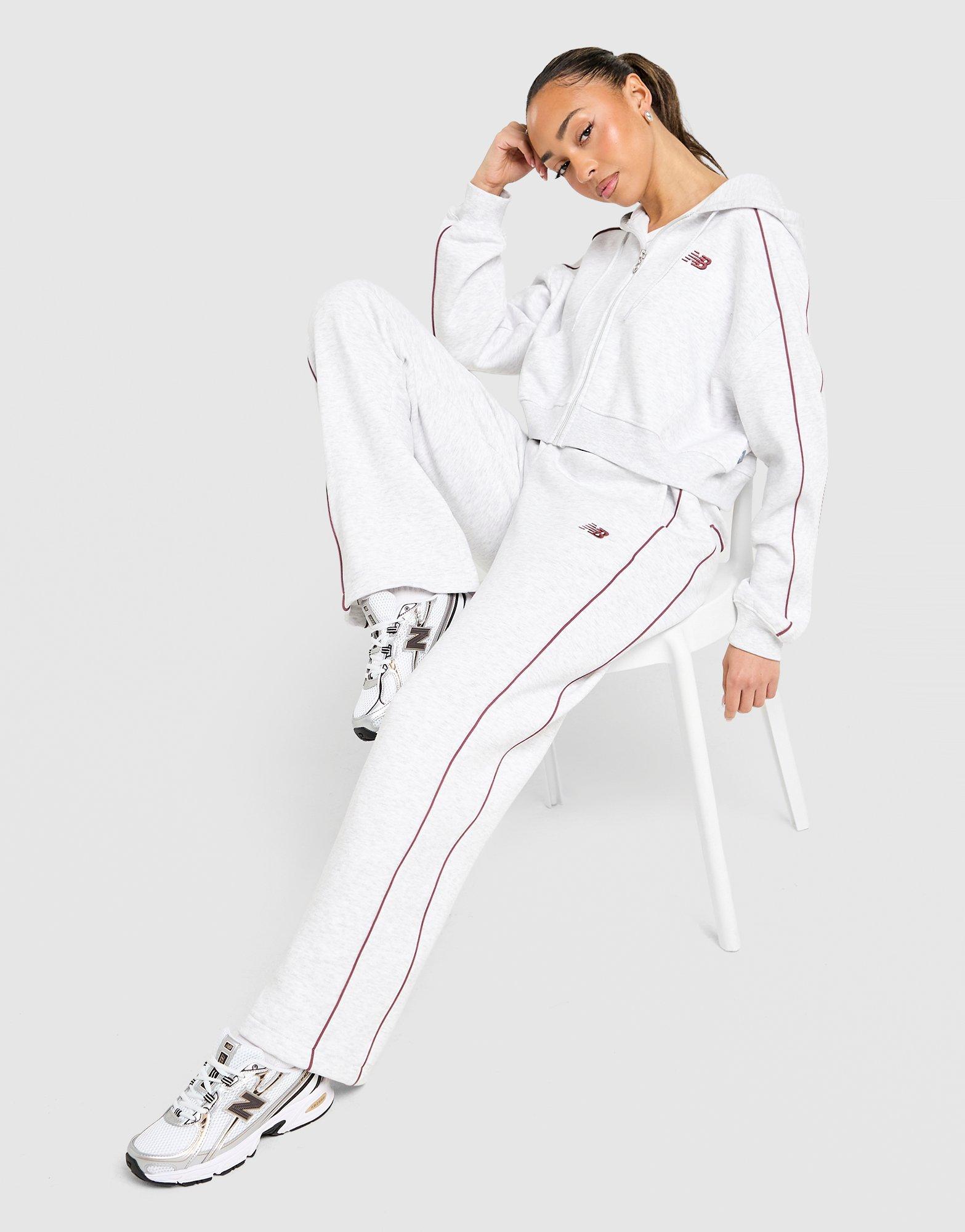 New Balance Pantaloni della tuta Wide Leg Pipe