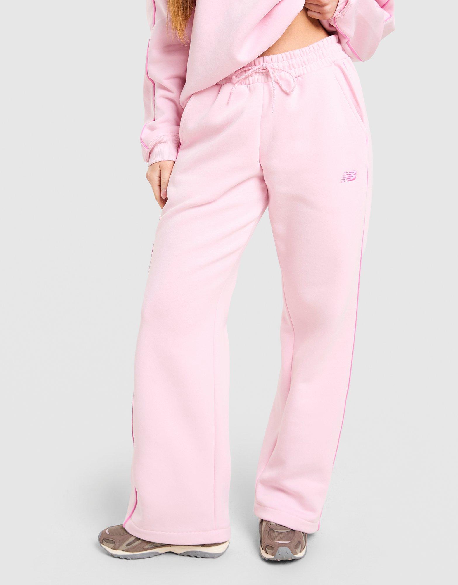 New Balance Leveät collegehousut Naiset