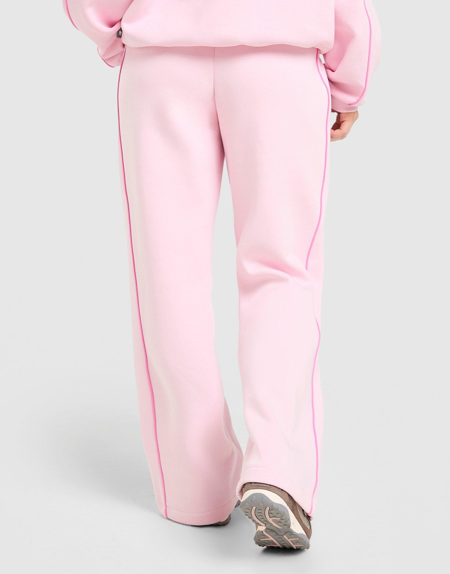 New Balance Leveät collegehousut Naiset